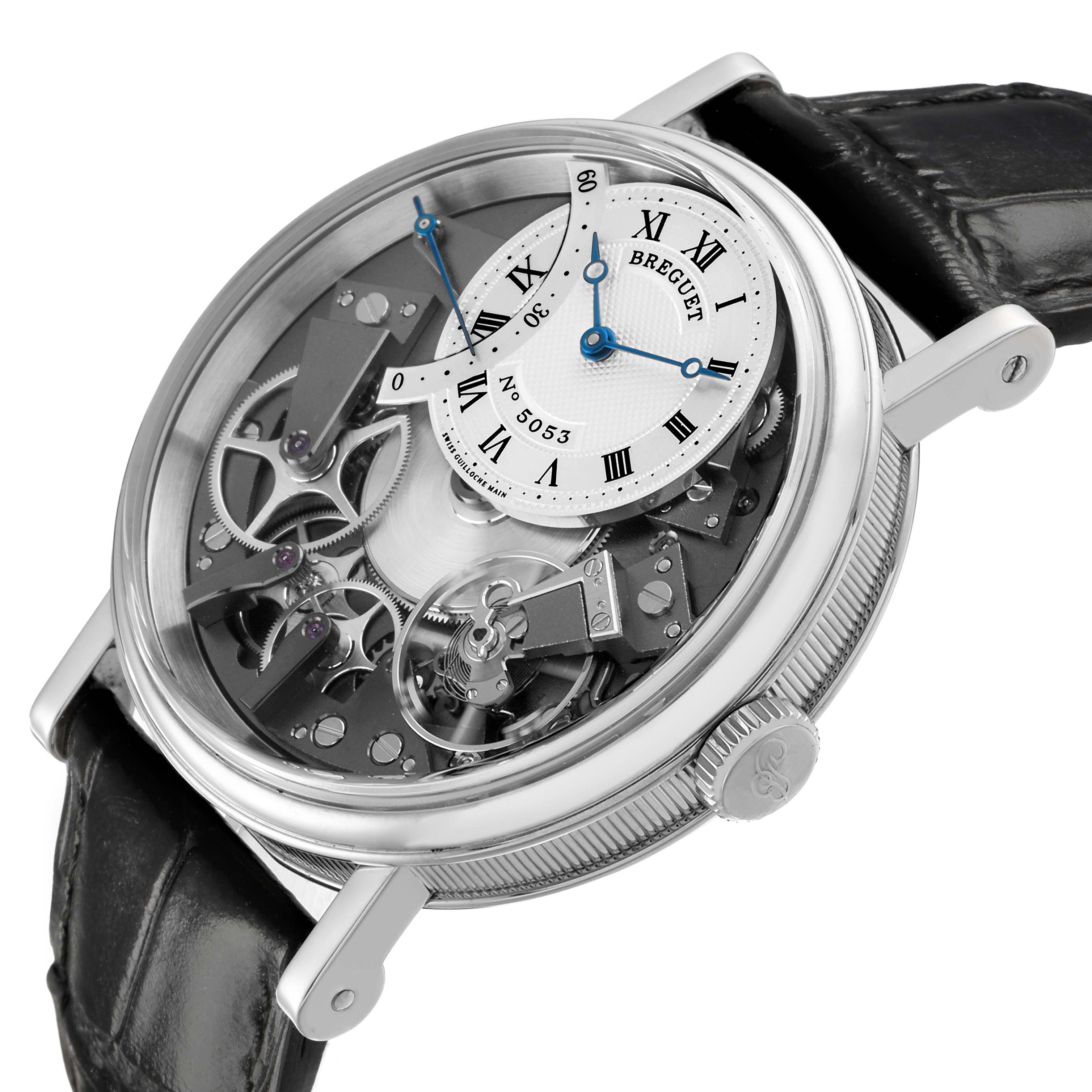 The Breguet Tradition 7097 Men's White Gold Silver Dial watch is shown at an angled view highlighting its intricate movement, dial, and black leather strap.