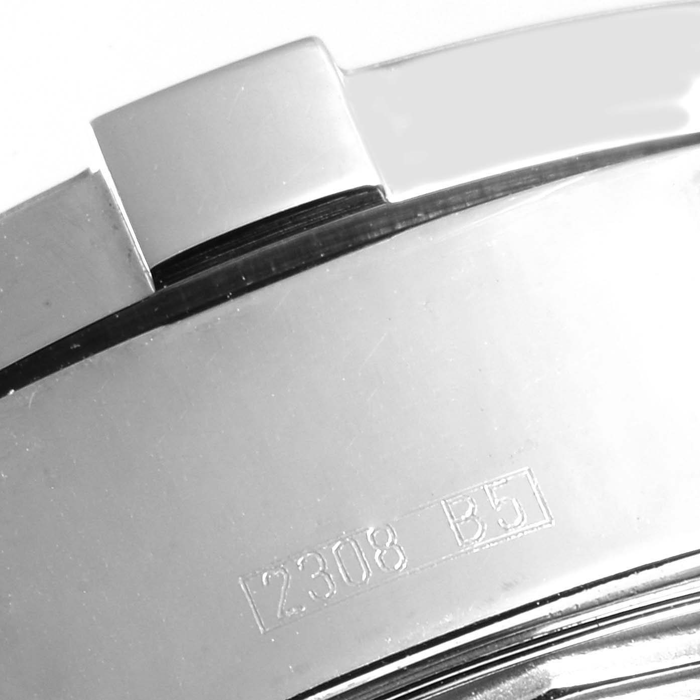 This close-up image shows the engraved serial number on the bezel of the Breitling A13340 Men's Stainless Steel Black Dial A13340 Men's Stainless Steel Black Dial Aeromarine Superocean Chronograph Watch A13340.