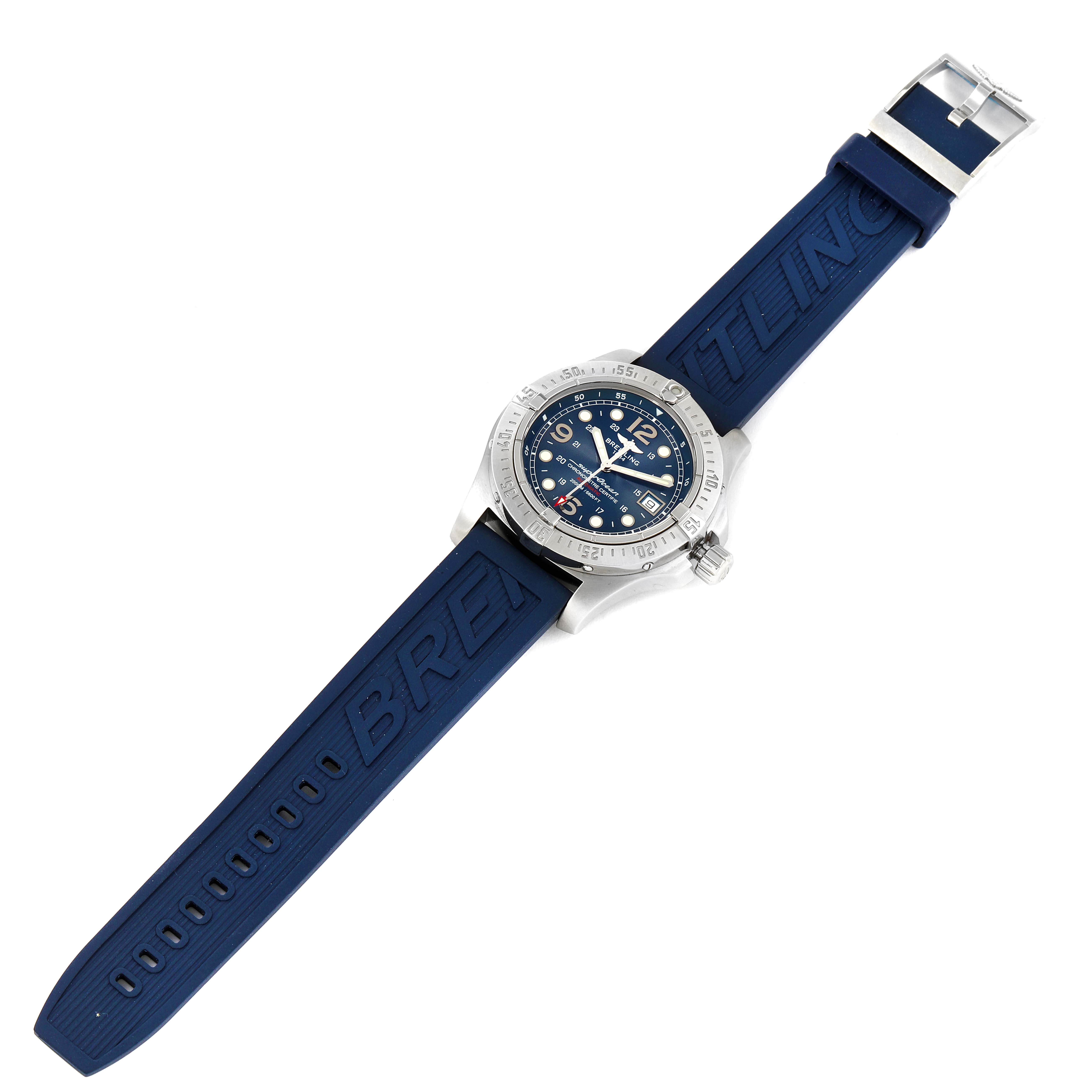 The Breitling Superocean A17390 Men's Stainless Steel Blue Dial A17390 Men's Stainless Steel Blue Dial watch is shown from a top-down angle, highlighting the blue dial, bezel, and rubber strap with "BREITLING" text.