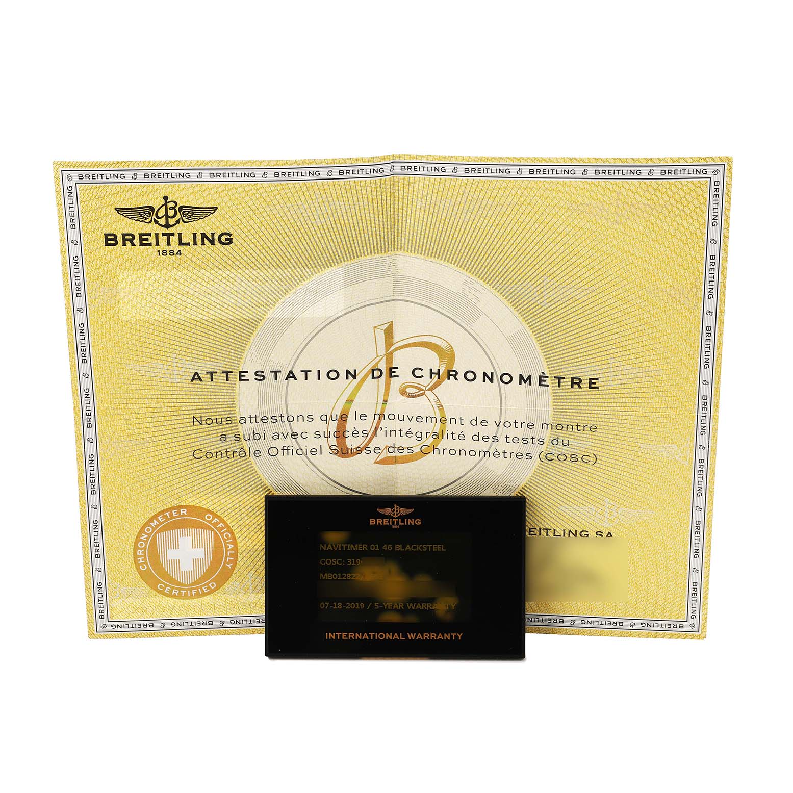 The image shows a Breitling Navitimer MB012822 / BE51 Men's Stainless Steel Black Dial certificate and an international warranty card.