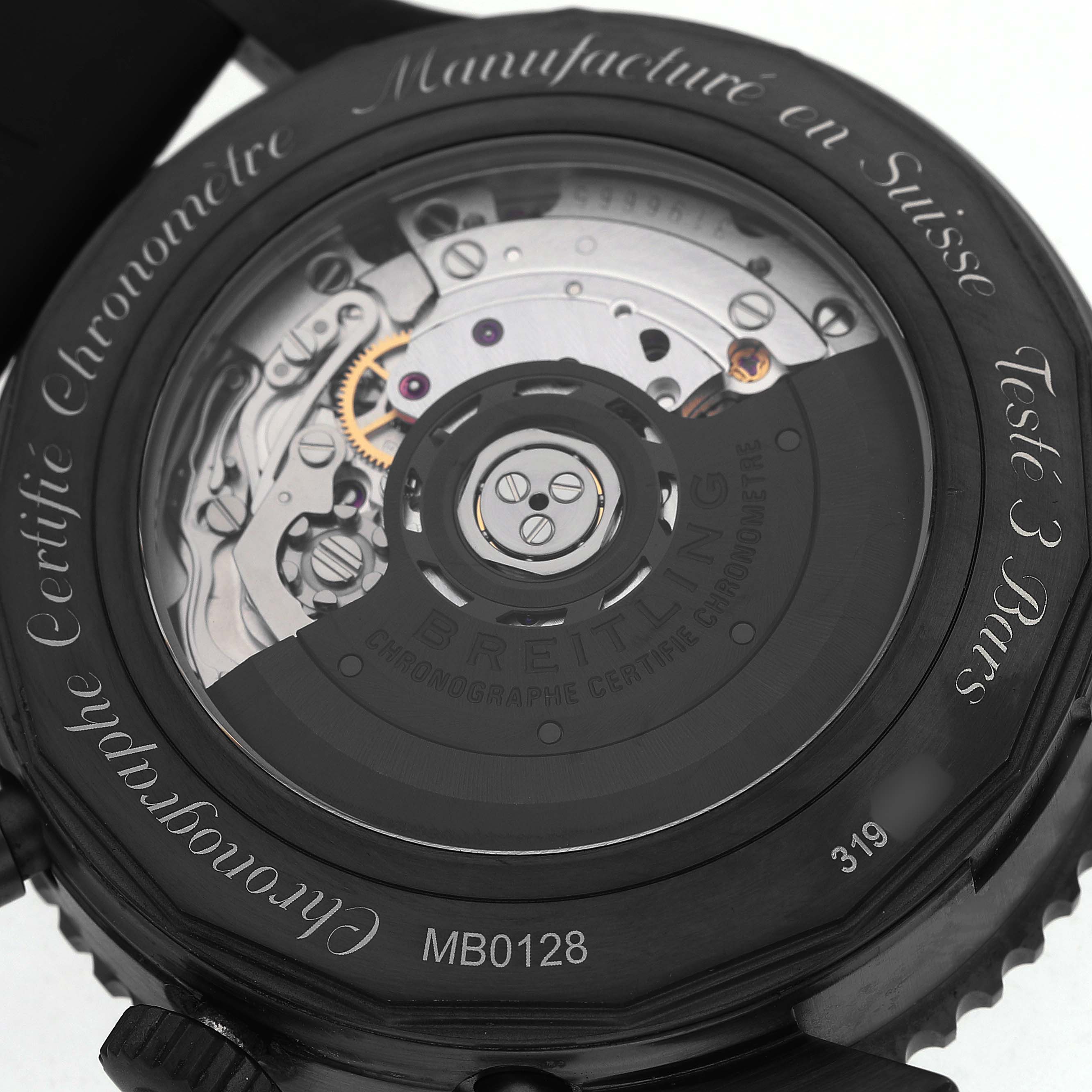 The image shows the back of a Breitling Navitimer MB012822 / BE51 Men's Stainless Steel Black Dial watch, highlighting its mechanical movement components.