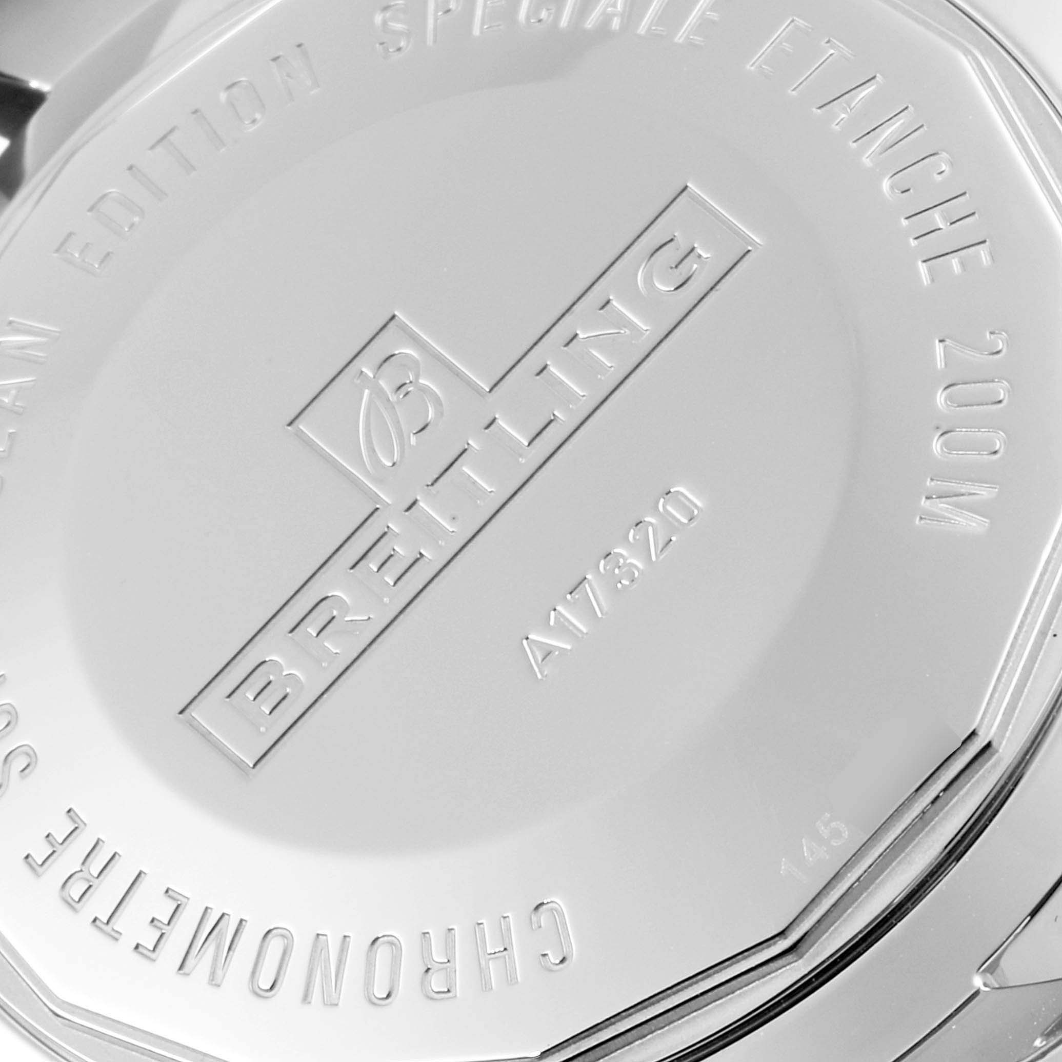 Close-up of the case back of the Breitling Superocean A17320 Men
s Stainless Steel Silver Dial A17320 Men
s Stainless Steel Silver Dial watch, displaying the brand
s logo and model details.