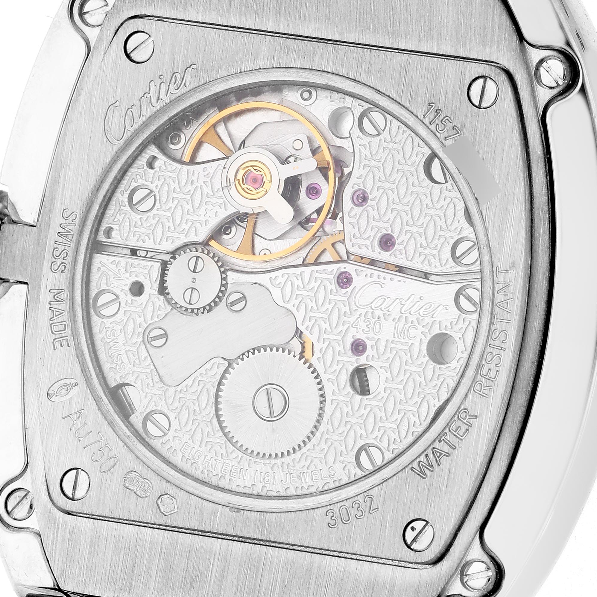 The image shows the intricate back view of the Cartier Baignoire WB520009 Women
s White Gold Silver Dial WB520009 Women
s White Gold Silver Dial watch, highlighting its exposed movement and engraved details.