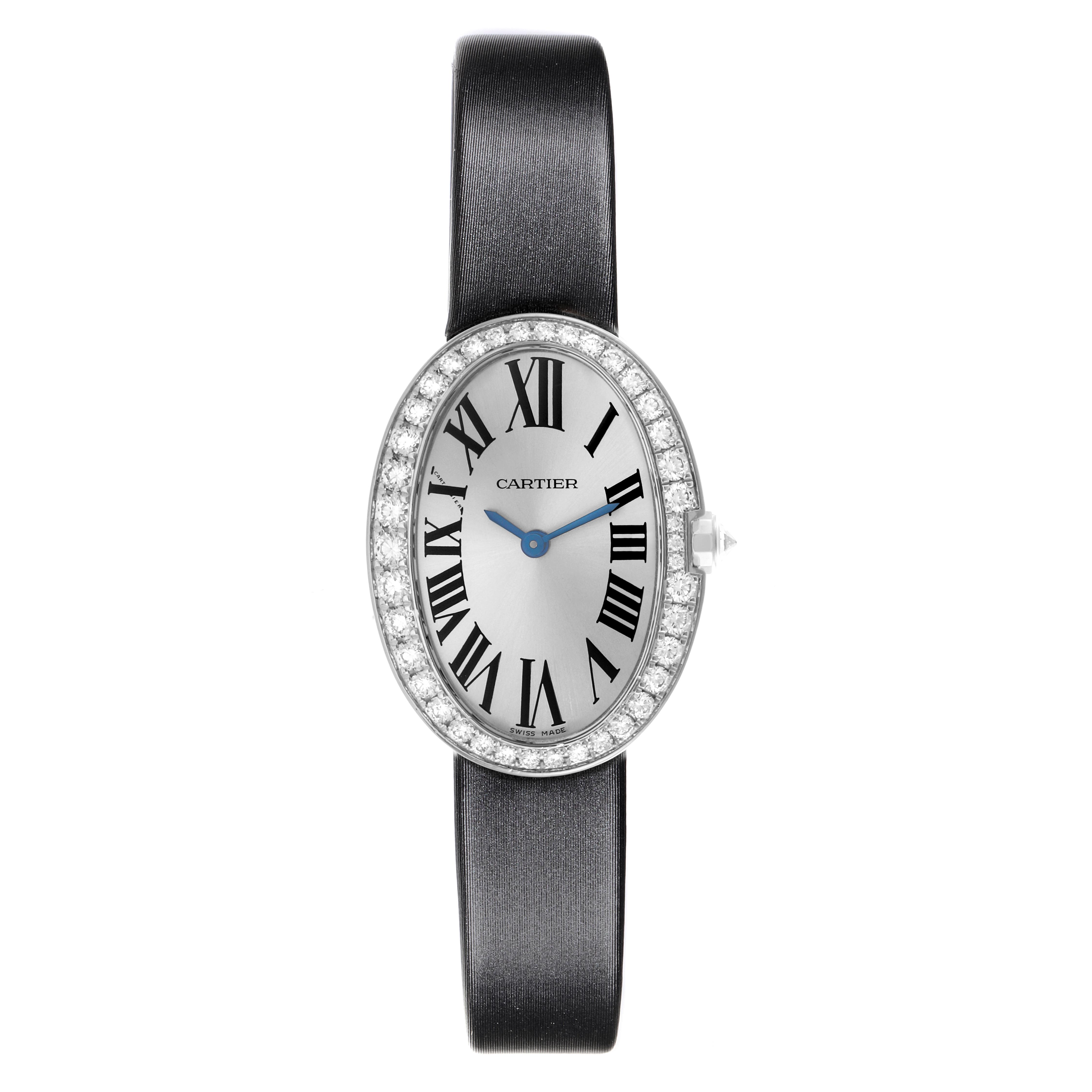 The Cartier Baignoire WB520008 Women
s White Gold Silver Dial WB520008 Women
s White Gold Silver Dial watch is shown from a front angle, displaying its oval face, Roman numerals, diamond bezel, and strap.
