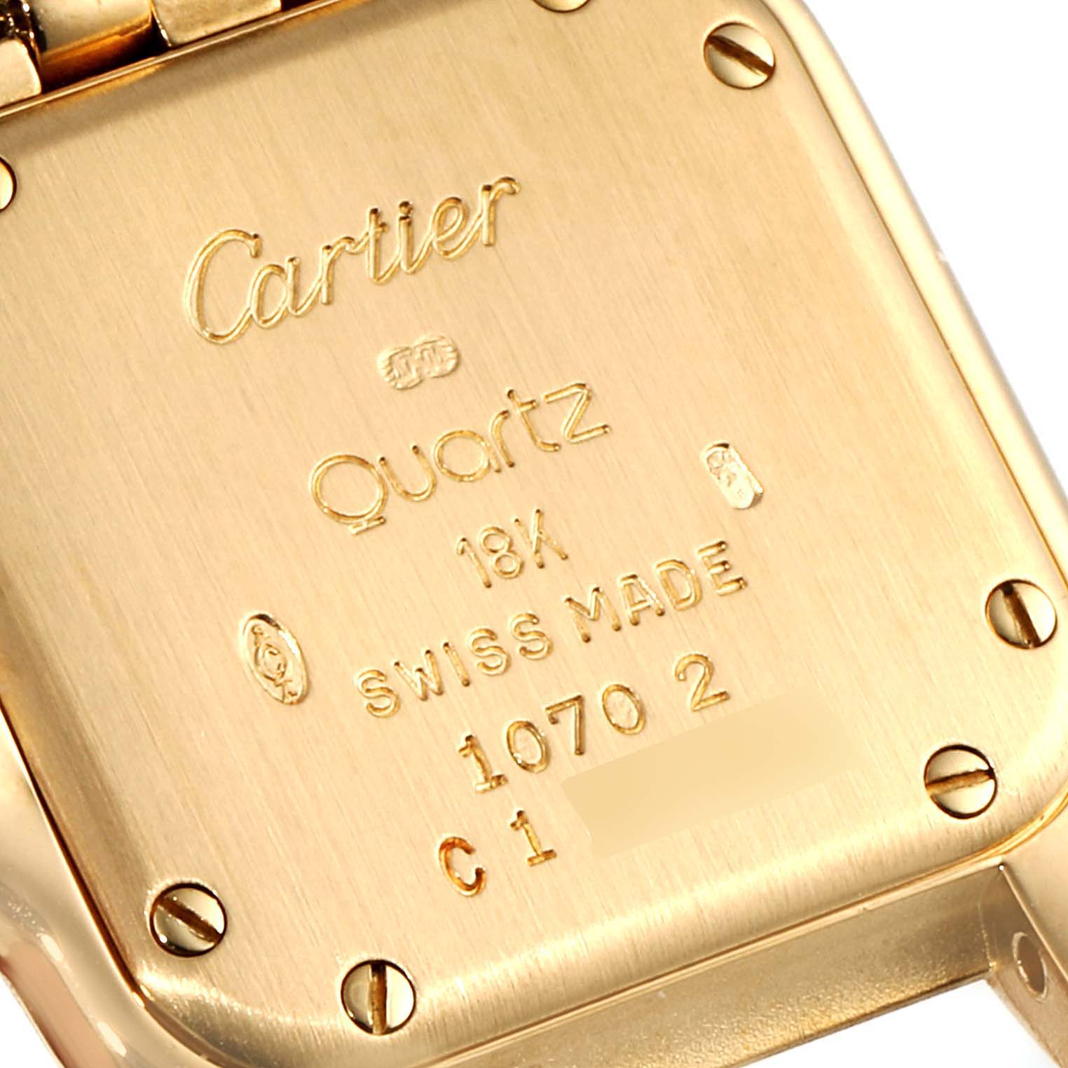 The image shows the back of a Cartier Panthere W25022B9 Women's Yellow Gold Silver Dial W25022B9 Women's Yellow Gold Silver Dial watch, highlighting its engraved details and screws.