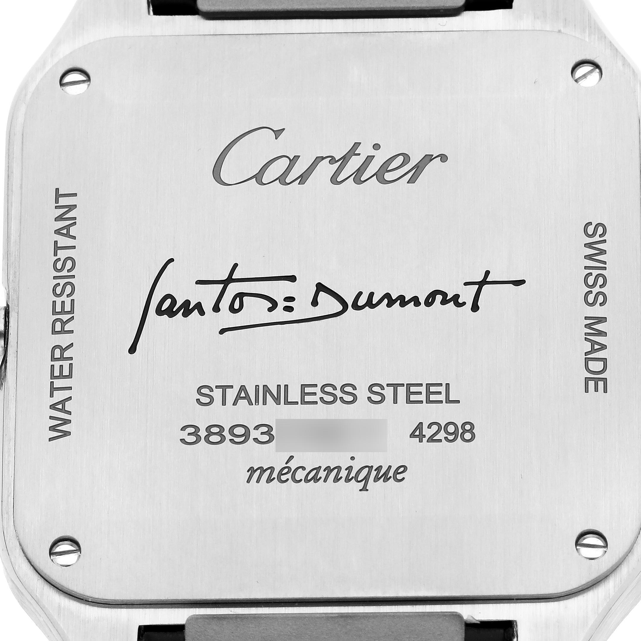 The image shows the back case of the Cartier Santos Dumont WSSA0046 Men's Stainless Steel Black Dial WSSA0046 Men's Stainless Steel Black Dial watch, highlighting brand engravings and materials.