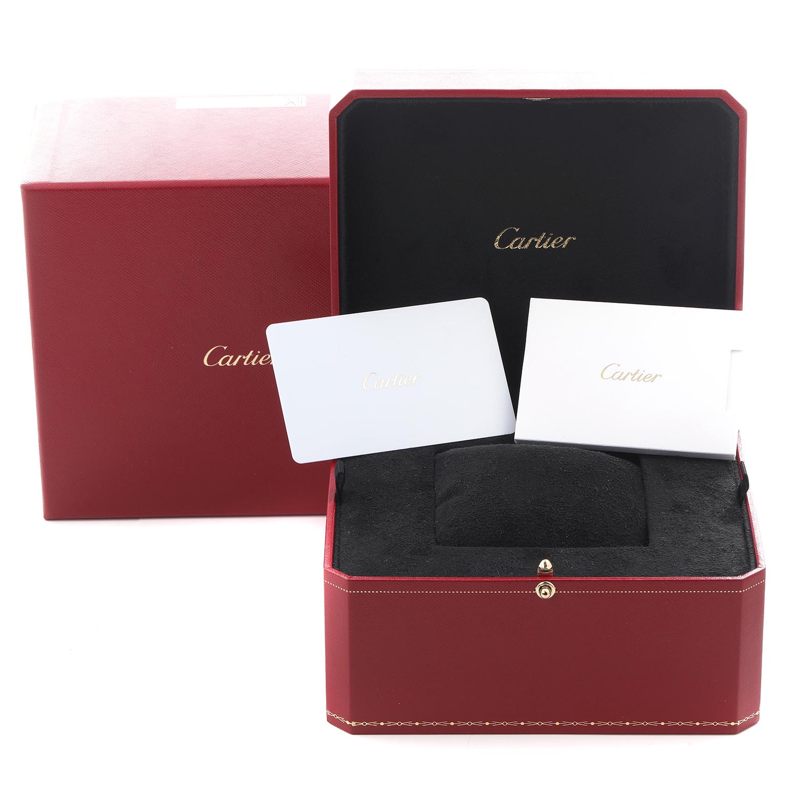 The image shows the Cartier Santos Dumont WSSA0046 Men's Stainless Steel Black Dial WSSA0046 Men's Stainless Steel Black Dial watch box and accessories, including cards, from a front-facing angle.