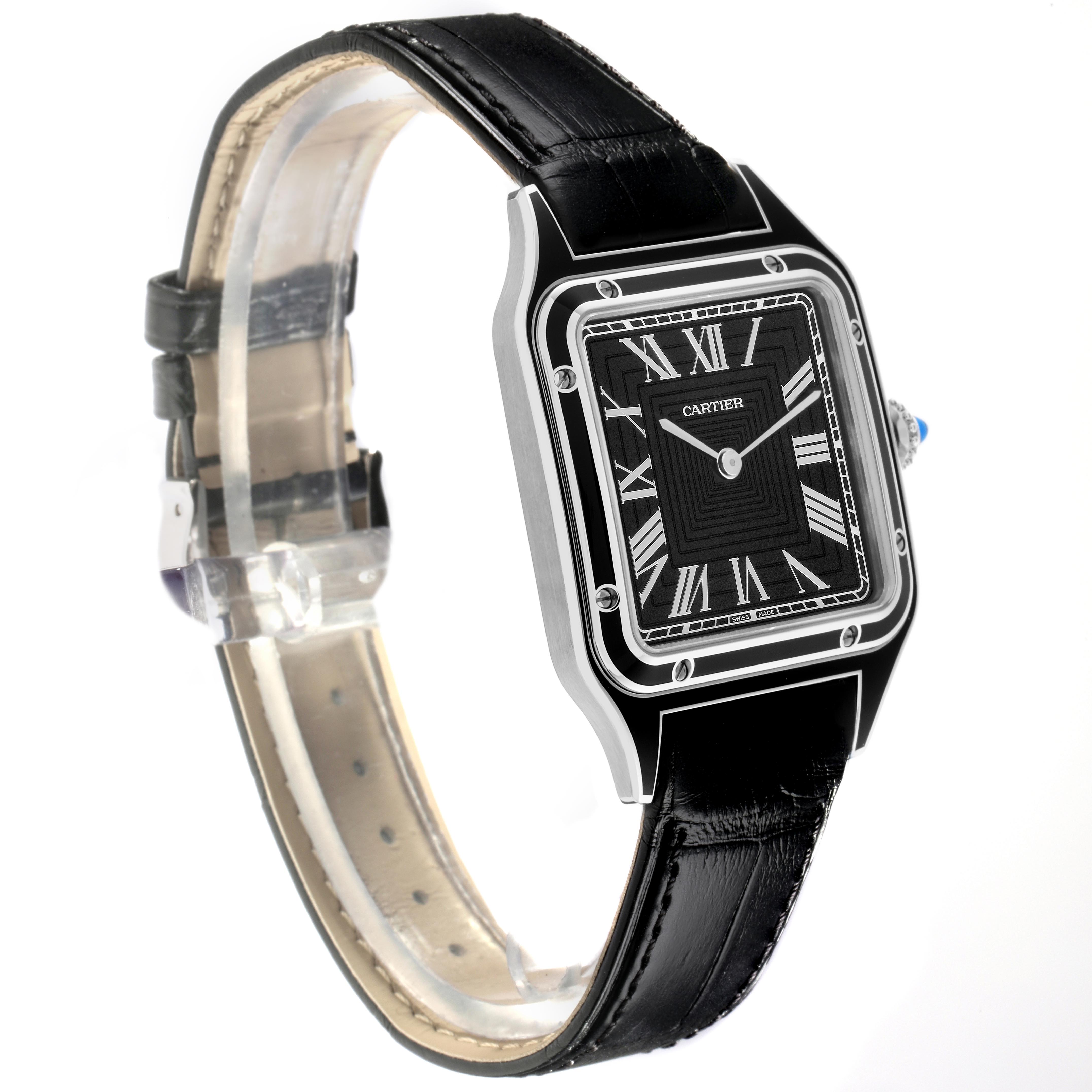The Cartier Santos Dumont WSSA0046 Men's Stainless Steel Black Dial WSSA0046 Men's Stainless Steel Black Dial watch is shown at a three-quarter angle, highlighting its black dial, Roman numerals, case, and leather strap.