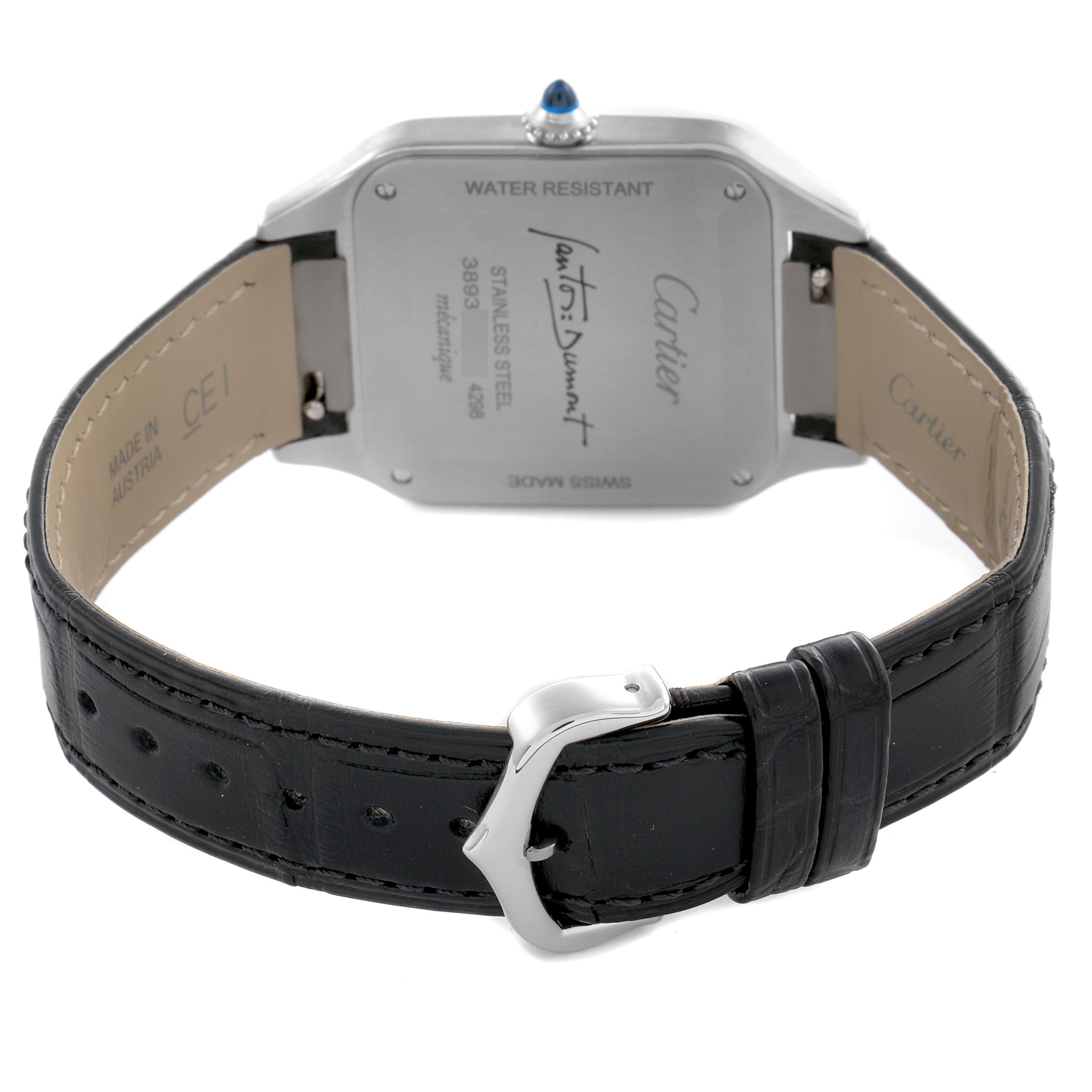 The image shows the back of a Cartier Santos Dumont WSSA0046 Men's Stainless Steel Black Dial WSSA0046 Men's Stainless Steel Black Dial watch with a black leather strap and silver buckle.