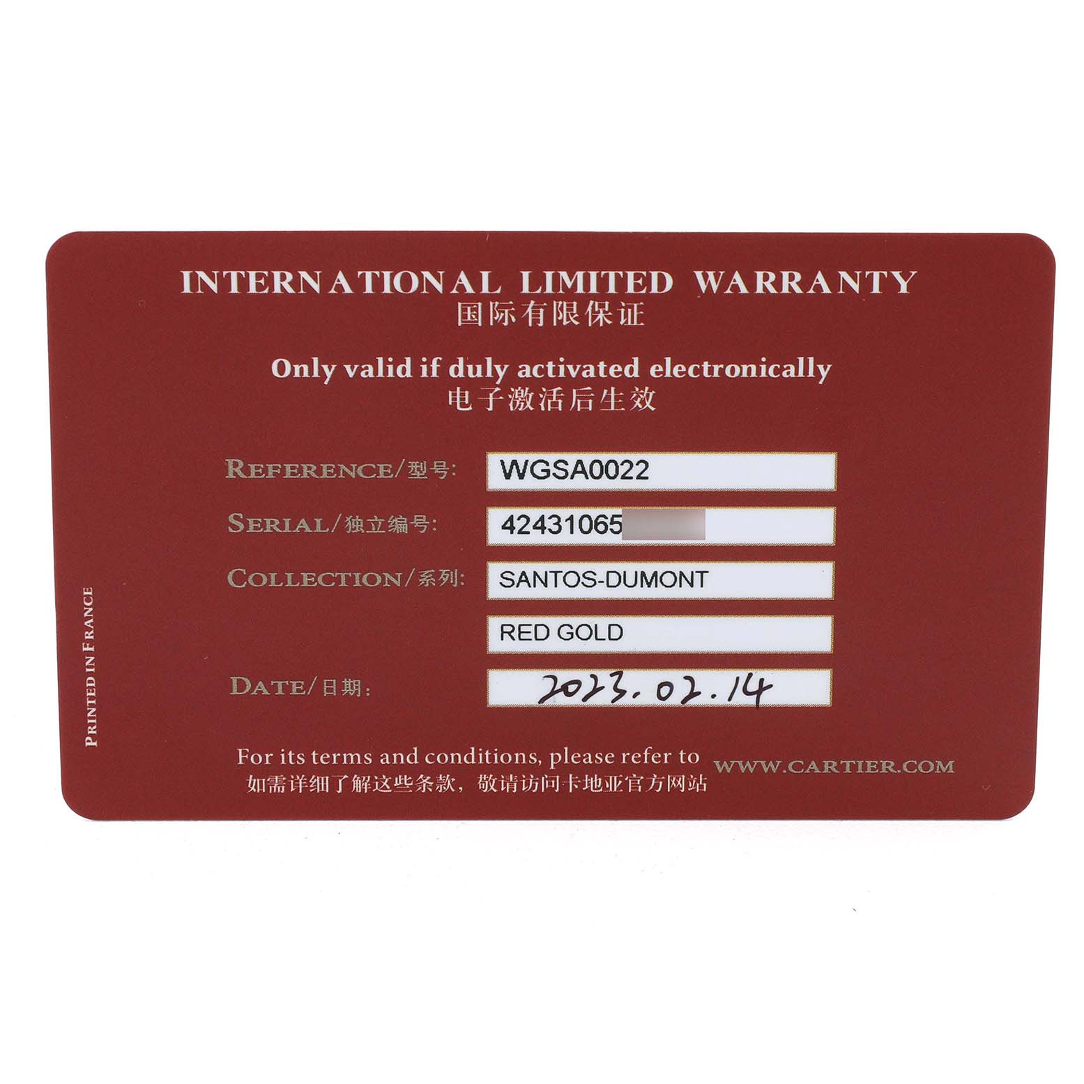 The image shows an International Limited Warranty card for the Santos Dumont model by Cartier, detailing reference, serial, and date.