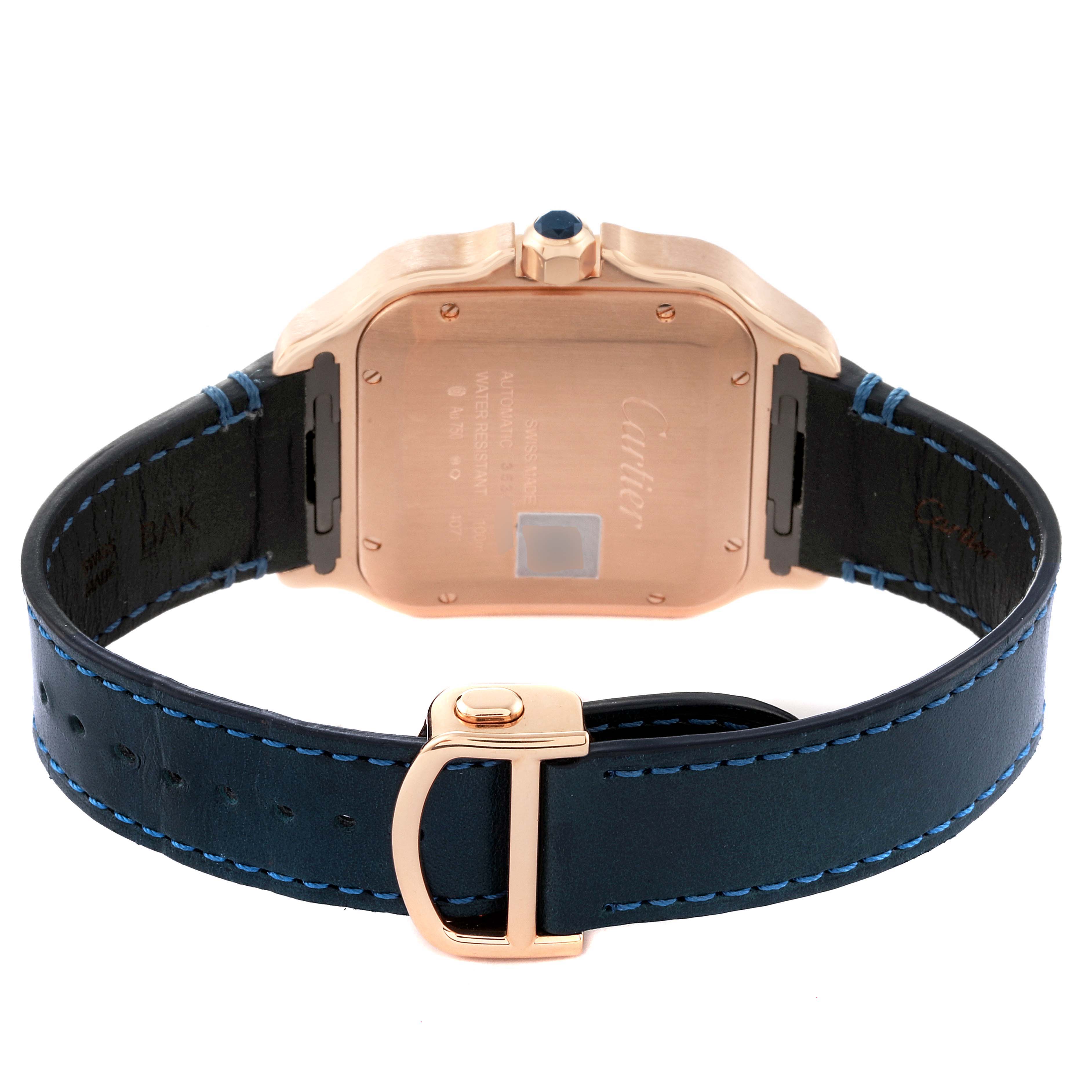 This image shows the back view of a Cartier Santos WGSA0019 Men's Rose Gold Silver Dial WGSA0019 Men's Rose Gold Silver Dial watch, highlighting the case back and part of the leather strap with a buckle.