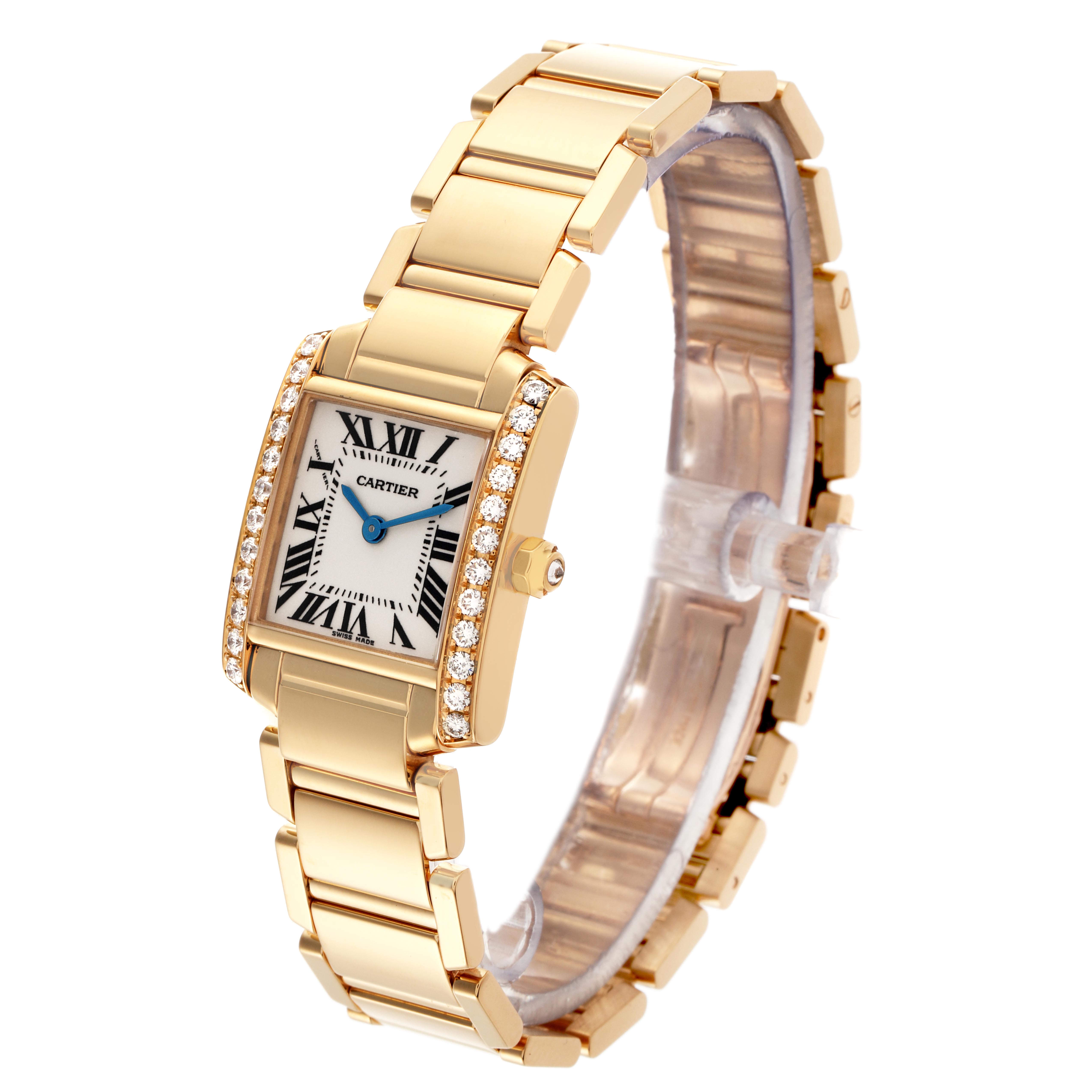 The Cartier Tank Française watch is shown at an angled side view, highlighting the face, diamond-set bezel, and metal bracelet.