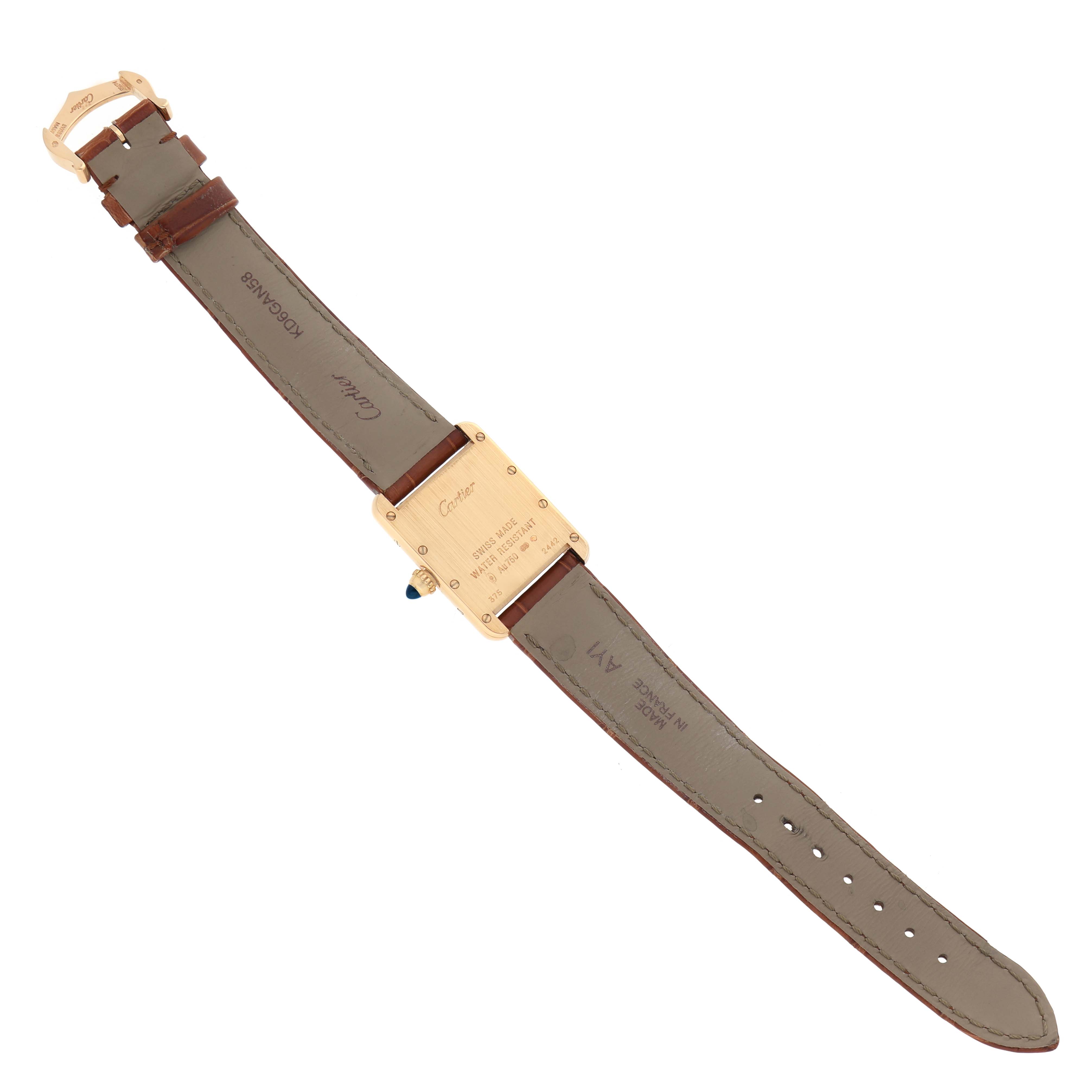 The image shows the back of a Cartier Tank Louis W1529856 Women's Yellow Gold Silver Dial watch, highlighting the case, strap, and clasp.