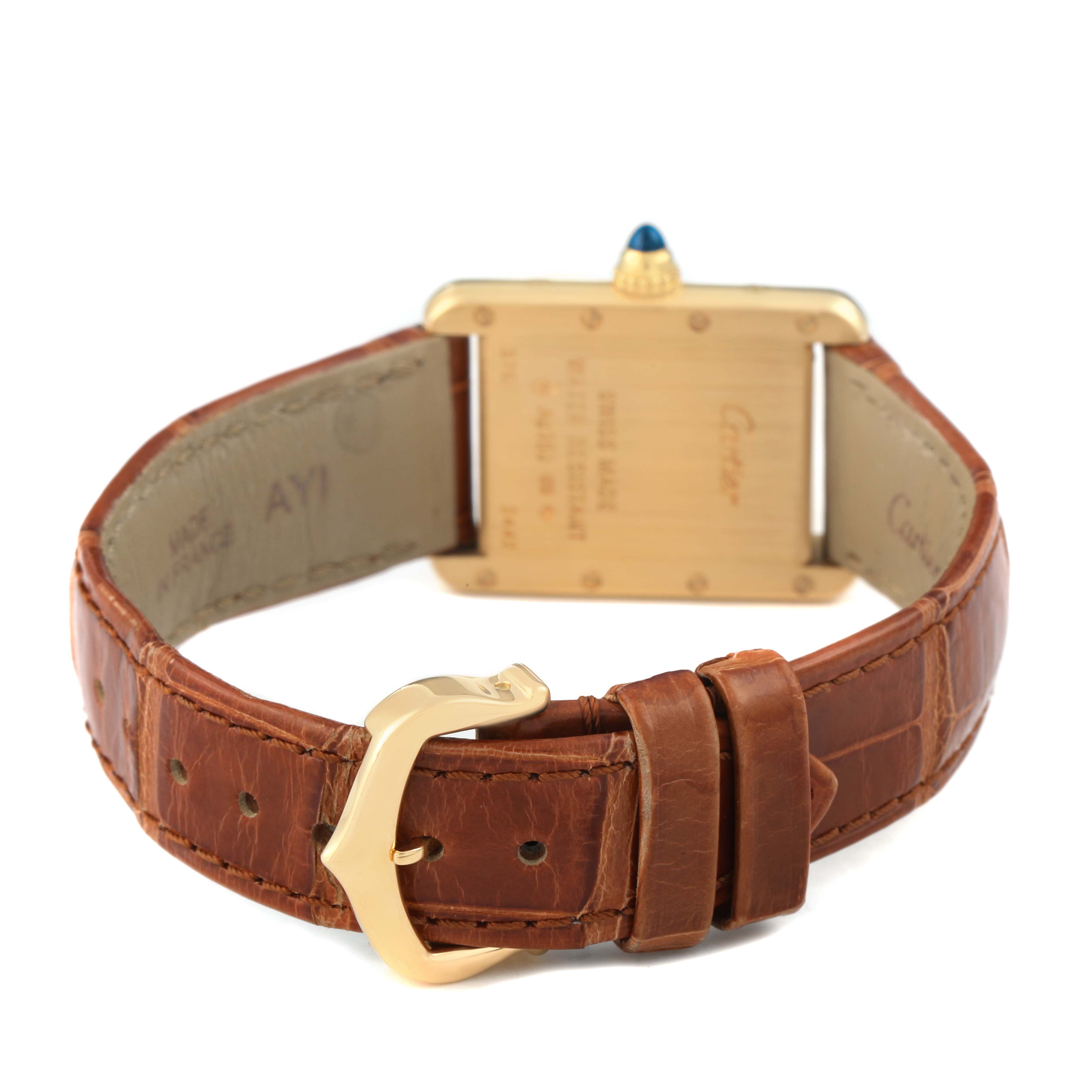 The image shows the back of the Cartier Tank Louis W1529856 Women's Yellow Gold Silver Dial watch, focusing on the case, strap, and buckle.