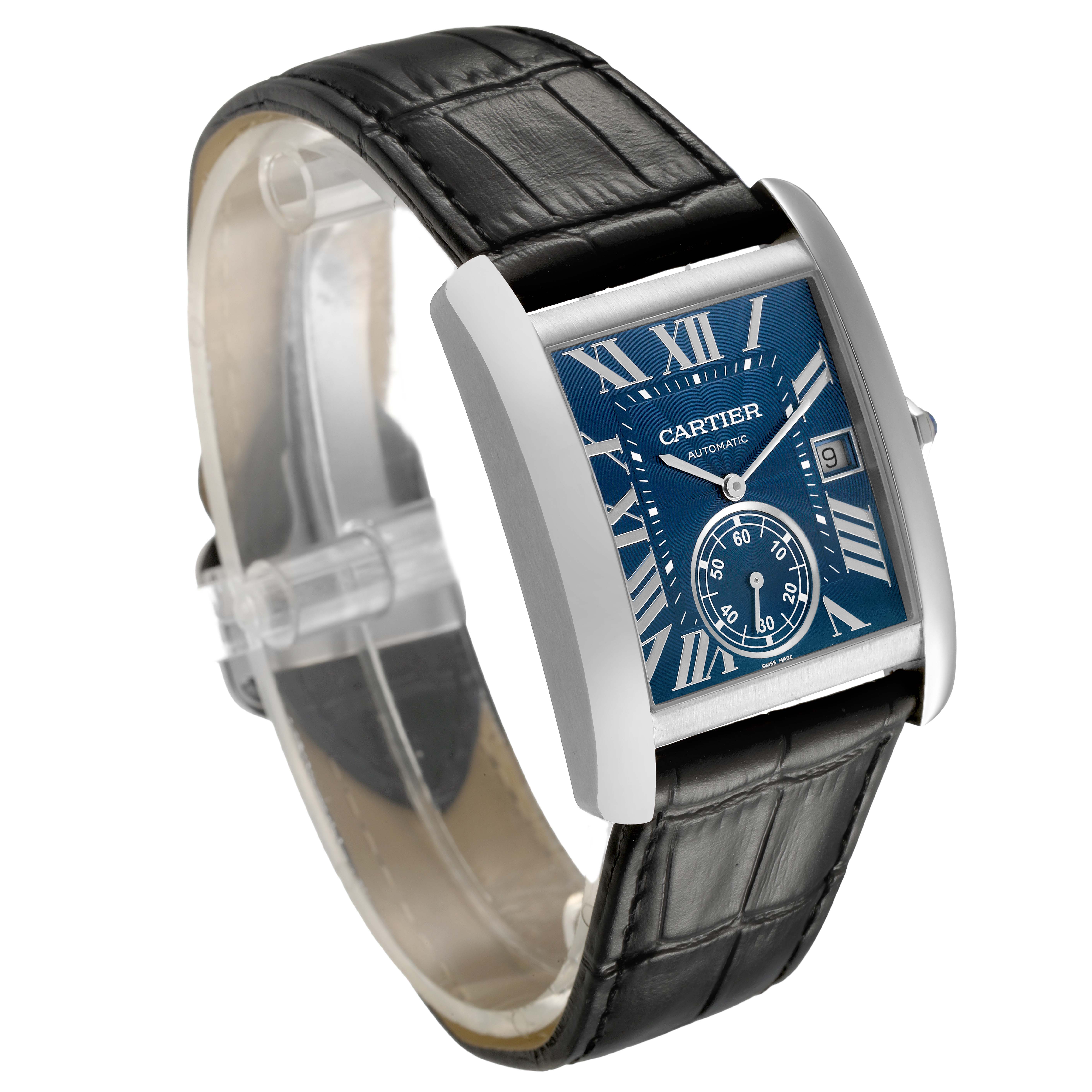 The Cartier Tank MC WSTA0010 Men's Stainless Steel Blue Dial watch is shown at a three-quarter angle, highlighting its blue dial, Roman numerals, and black leather strap.