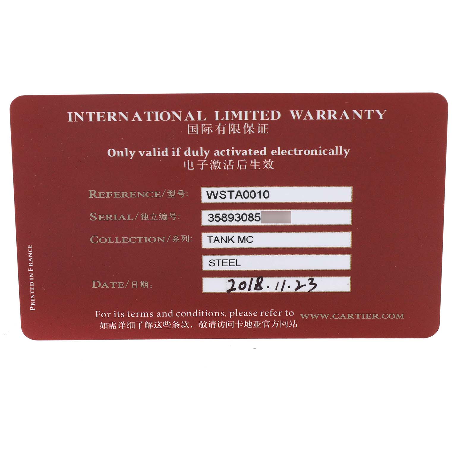 This image shows an international limited warranty card for the Cartier Tank MC WSTA0010 Men's Stainless Steel Blue Dial watch model.