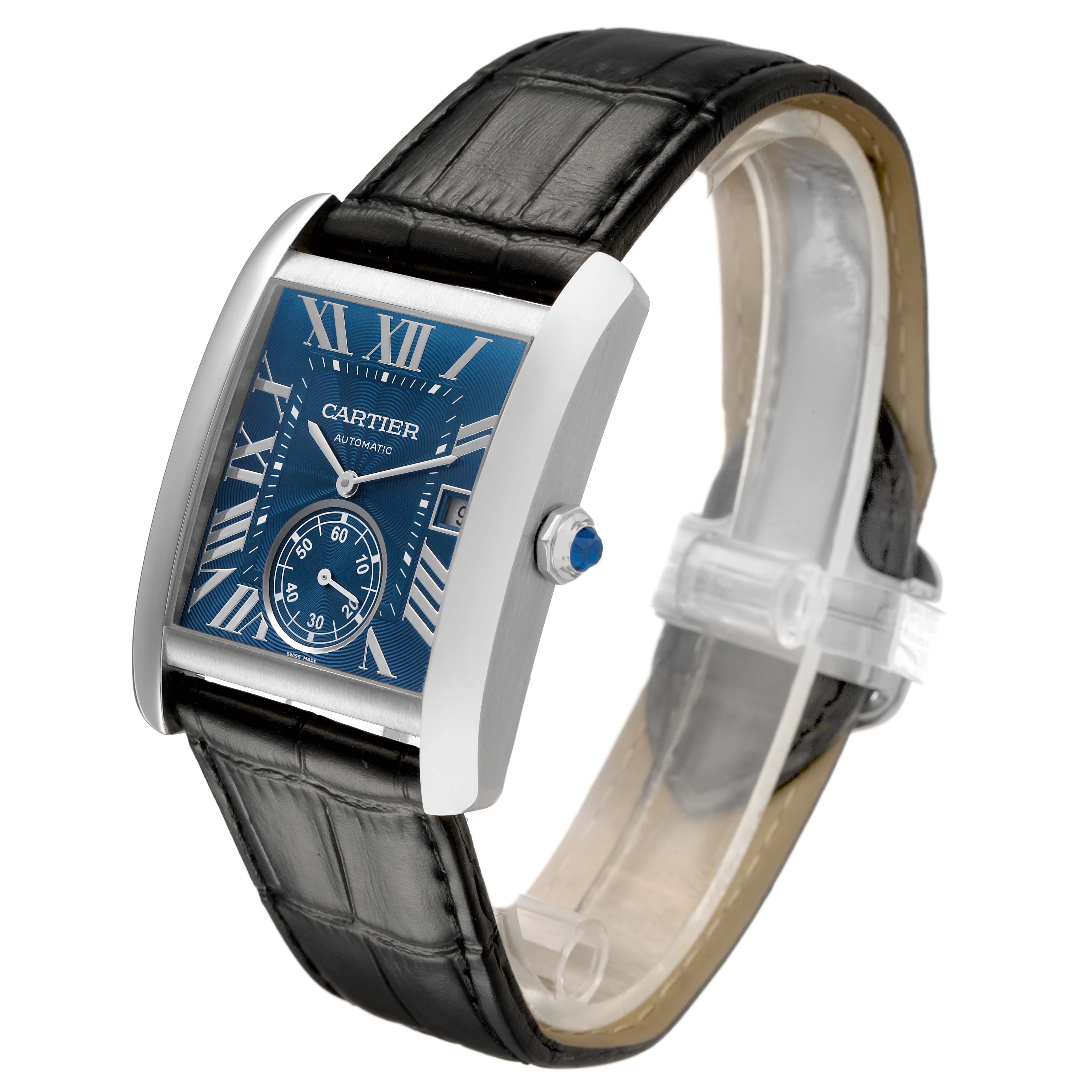 The Cartier Tank MC WSTA0010 Men's Stainless Steel Blue Dial watch is shown at a three-quarter angle, highlighting the blue dial, Roman numerals, and black leather strap.