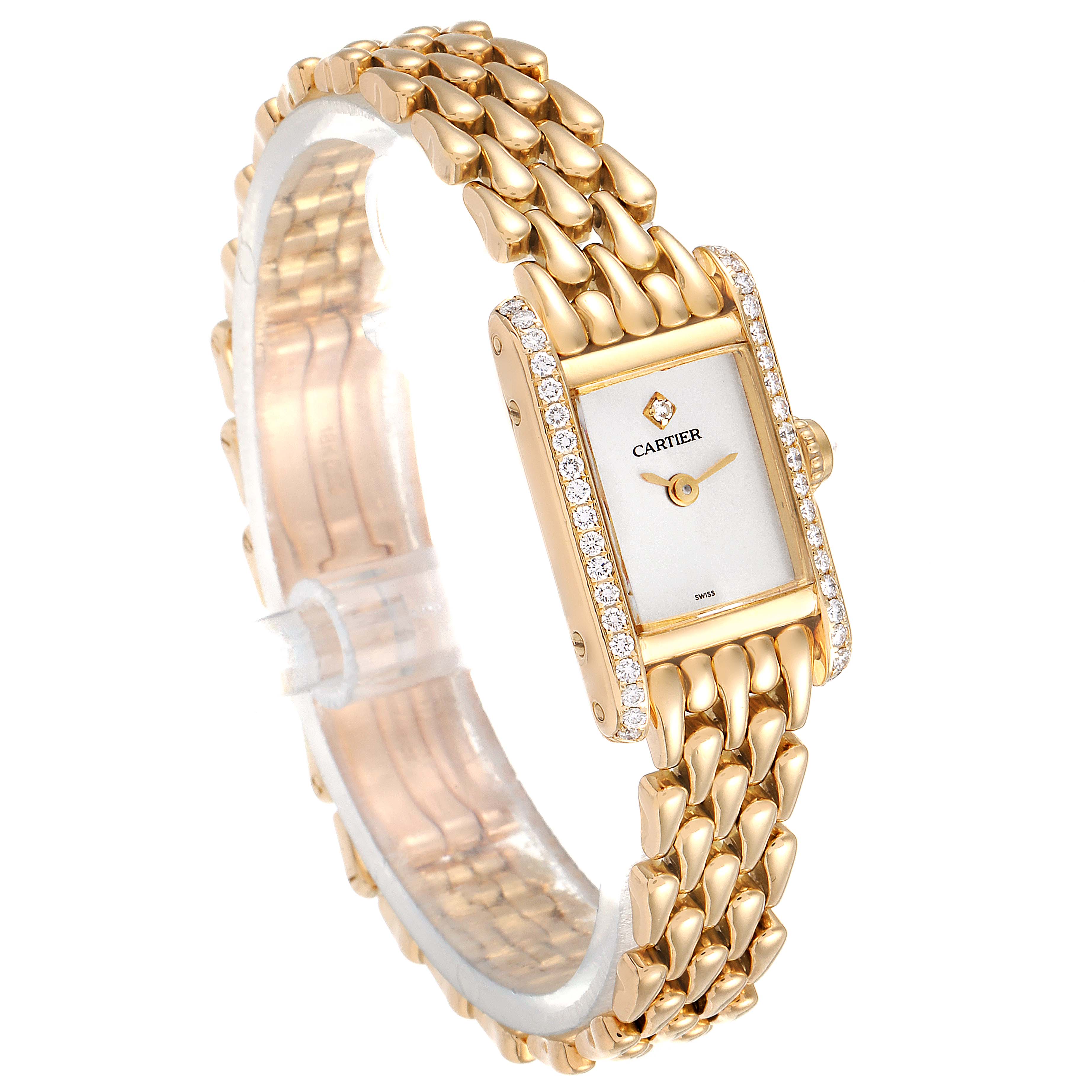 The image shows a Tank Louis Cartier watch at a slight side angle, displaying the bracelet and the face with diamond accents.