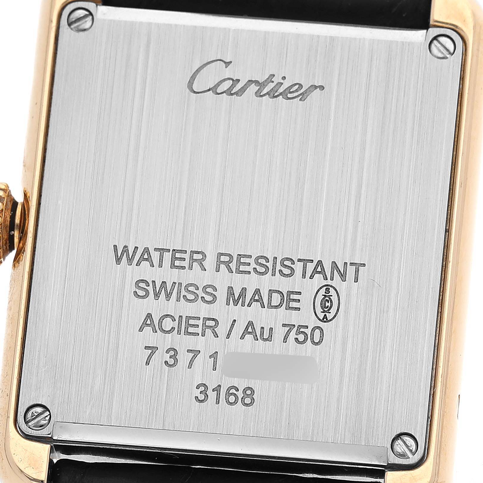 The image shows the back case of a Cartier Tank Solo W5200024 Women's Steel and Gold (two tone) Silver Dial watch, highlighting the brand and model details.