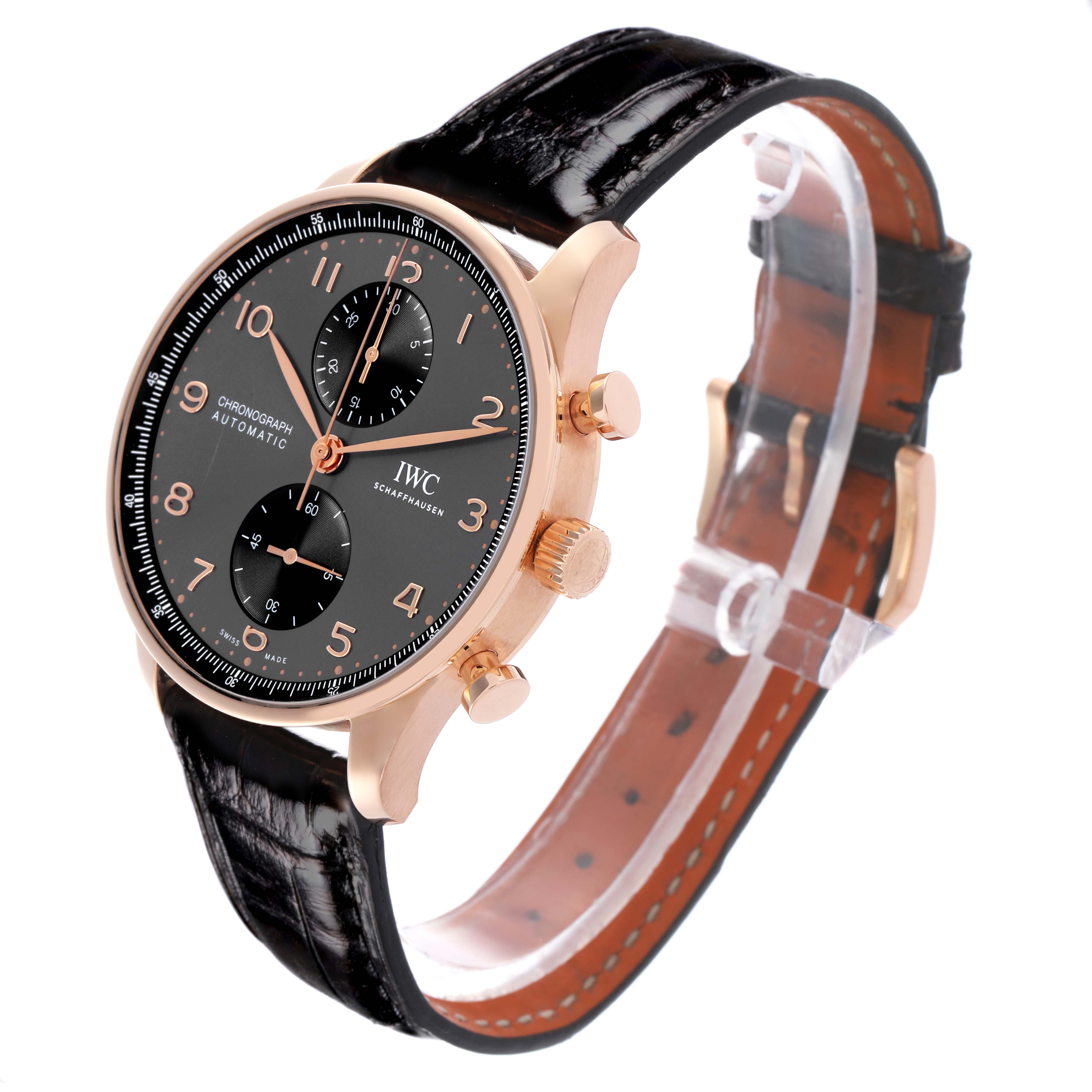 The IWC Portuguese IW371610 Men's Rose Gold Grey Dial IW371610 Men's Rose Gold Grey Dial watch is shown at a three-quarter angle, displaying the face, case, crown, pushers, and strap.