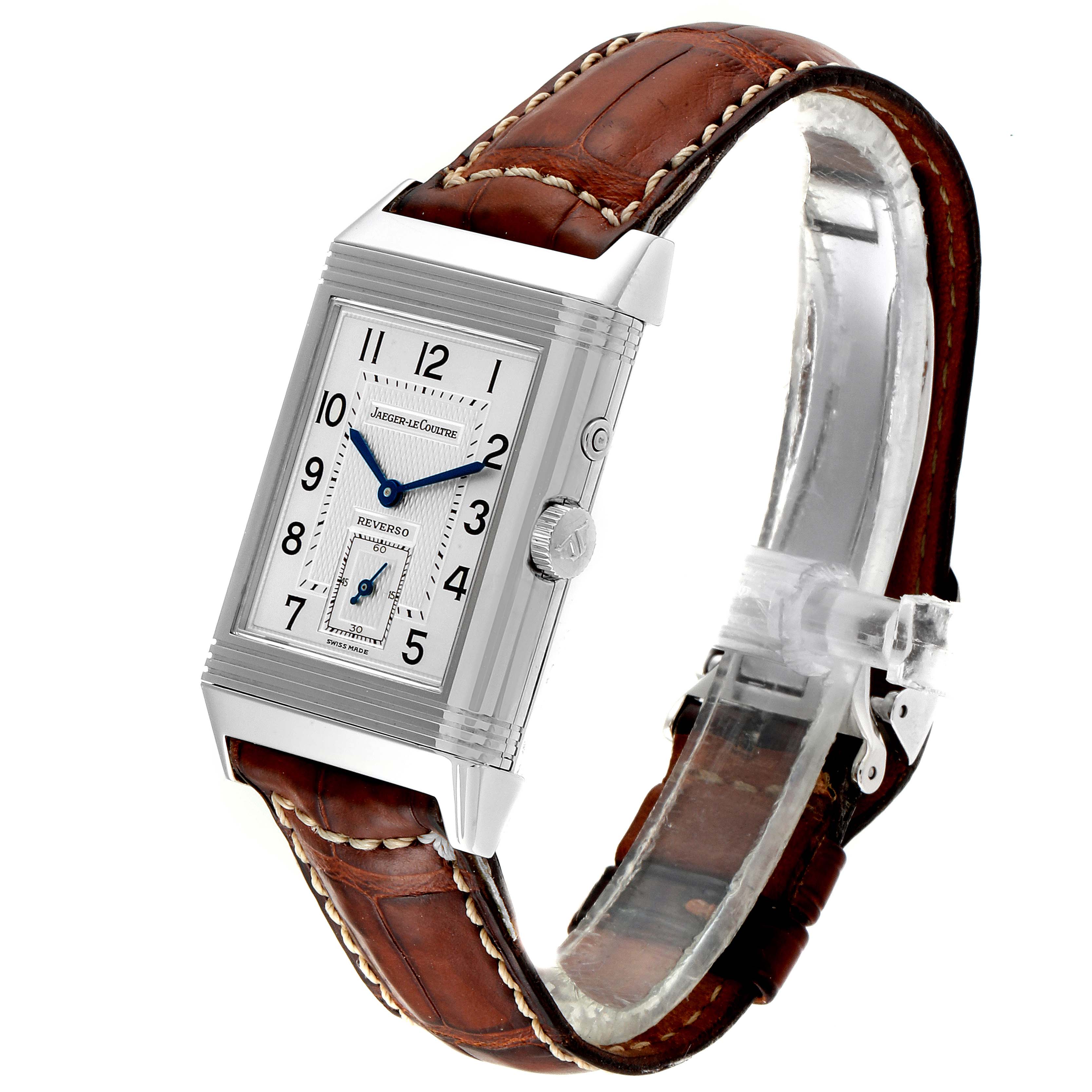 The image shows a Jaeger LeCoultre Reverso Q270854 Men
s Stainless Steel Silver Dial Q270854 Men
s Stainless Steel Silver Dial watch from a side angle, highlighting the leather strap and rectangular face.
