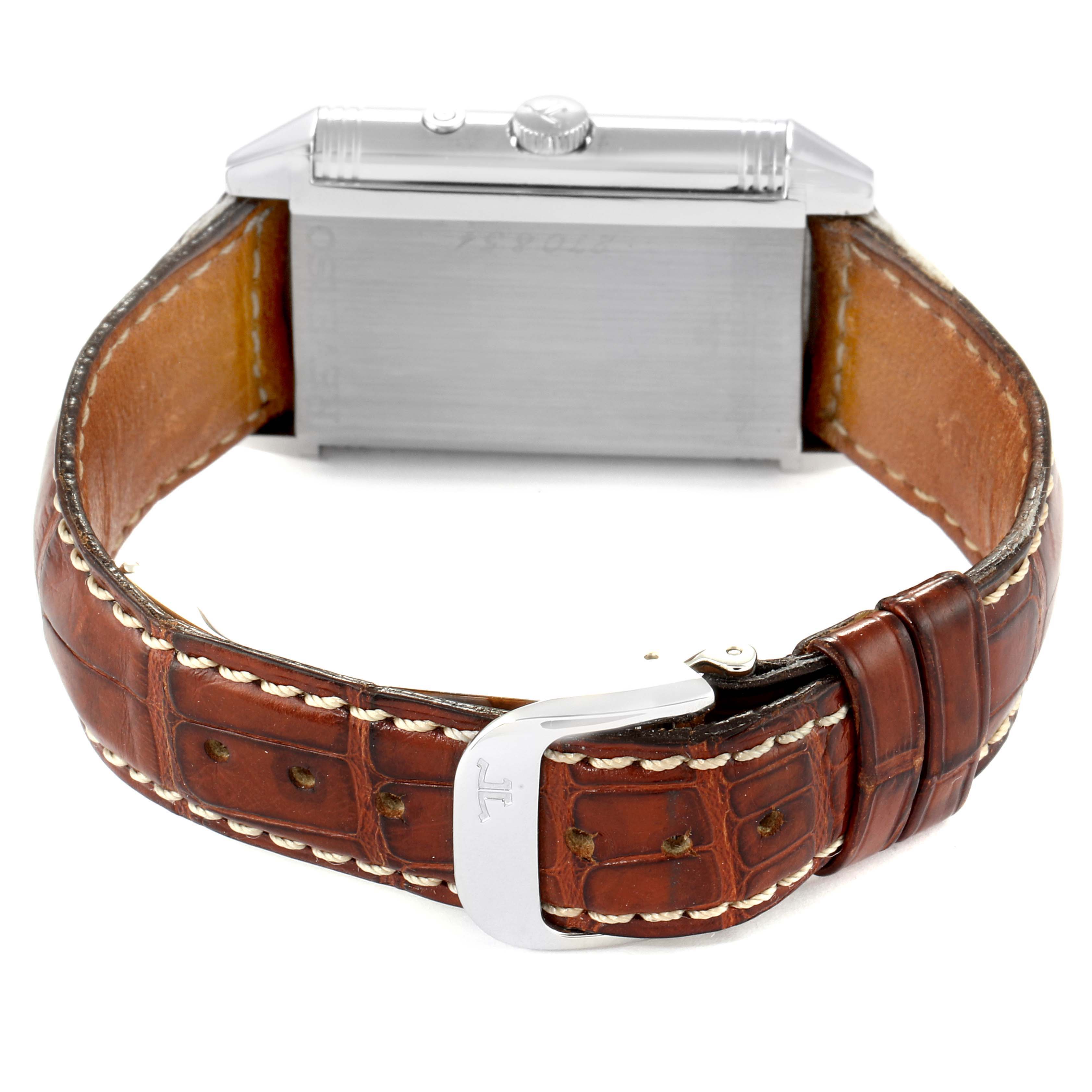 This image shows the side profile and back of a Jaeger LeCoultre Reverso Q270854 Men
s Stainless Steel Silver Dial Q270854 Men
s Stainless Steel Silver Dial watch, featuring its crown, case back, and leather strap.