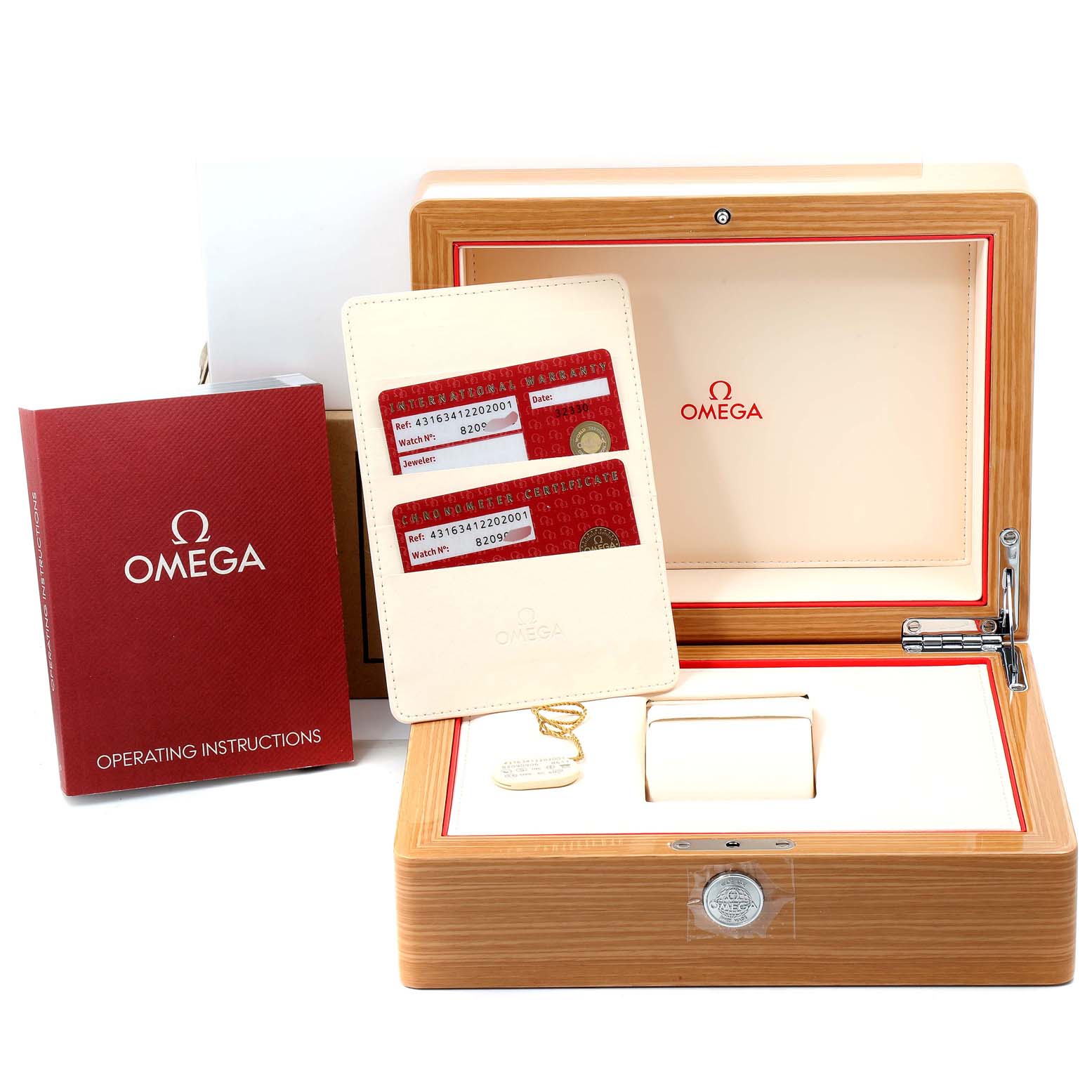 The image shows the Omega De Ville 431.63.41.22.02.001 Men's Rose Gold Silver Dial 431.63.41.22.02.001 Men's Rose Gold Silver Dial watch box, operating instructions, warranty cards, and a cleaning cloth.