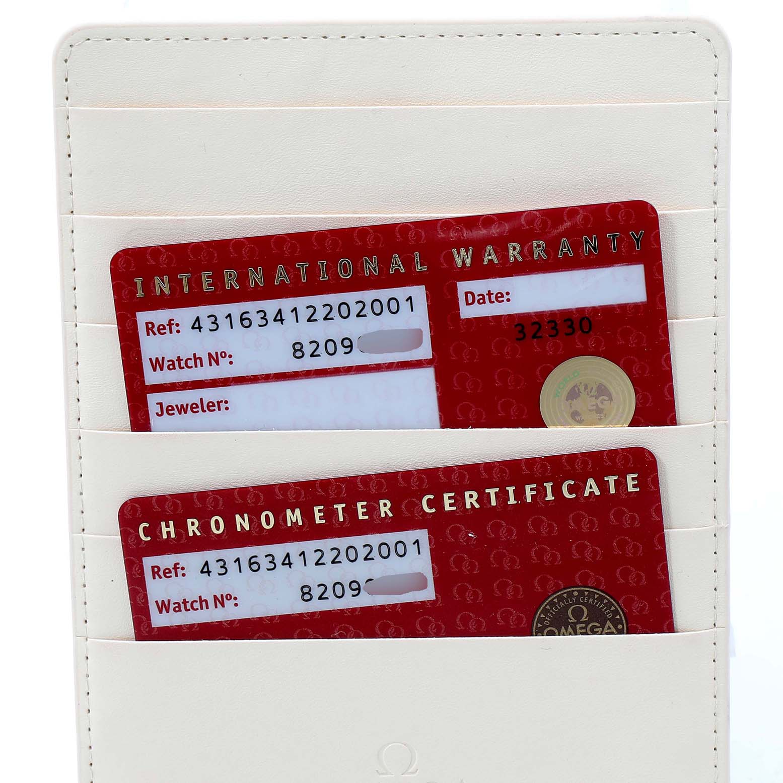 This image shows the warranty and chronometer certificate cards of an Omega De Ville 431.63.41.22.02.001 Men's Rose Gold Silver Dial 431.63.41.22.02.001 Men's Rose Gold Silver Dial watch in a white cardholder.