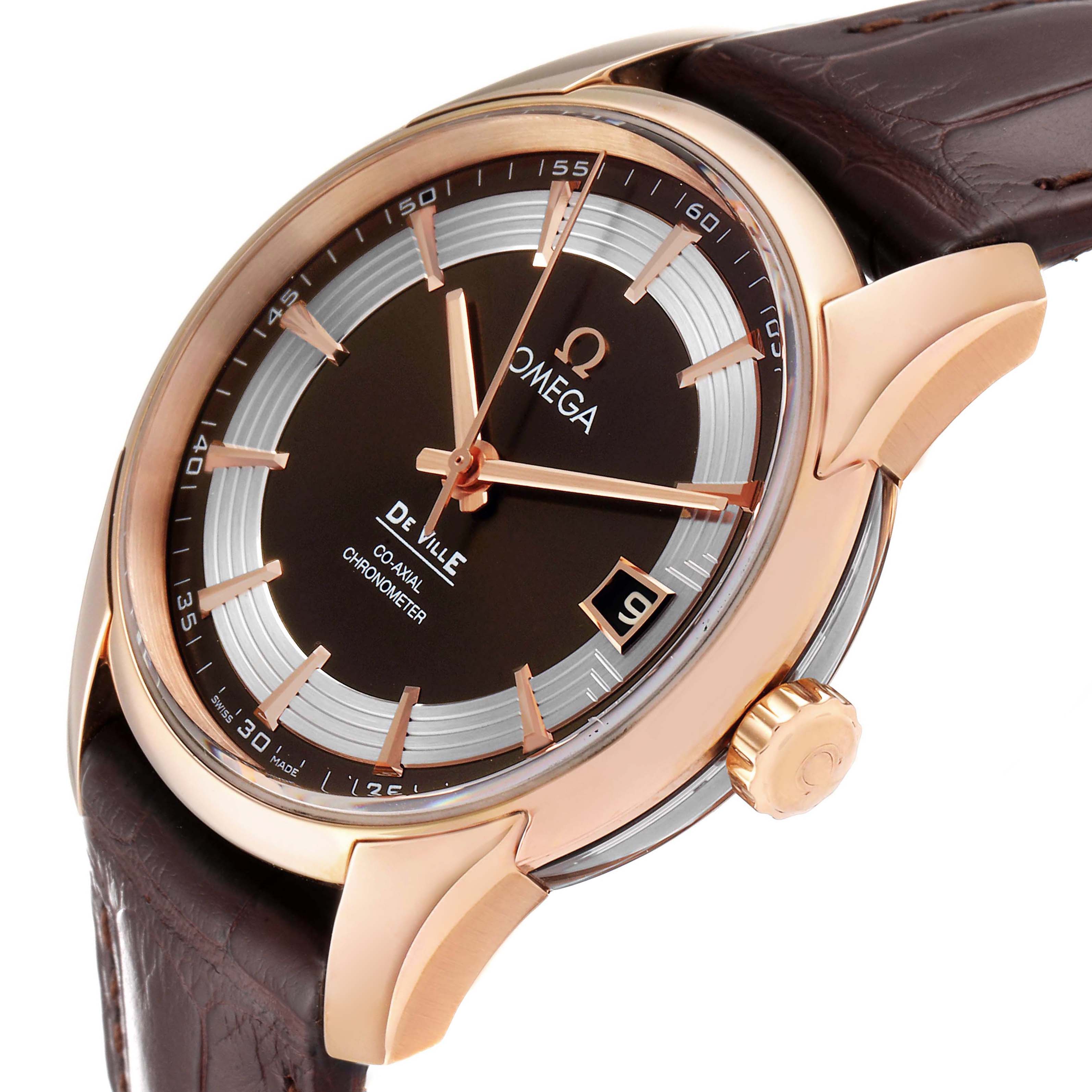 The image shows an angled view of the Omega De Ville 431.63.41.21.13.001 Men's Rose Gold Brown Dial 431.63.41.21.13.001 Men's Rose Gold Brown Dial watch, highlighting its face, case, crown, and leather strap.