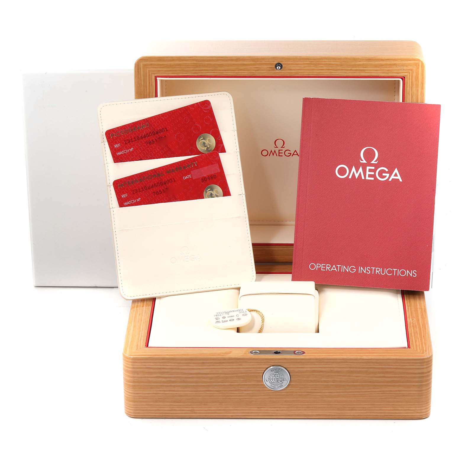 The image captures the Omega Aqua Terra 231.10.44.50.04.001 Men's Stainless Steel White Dial 231.10.44.50.04.001 Men's Stainless Steel White Dial watch packaging, warranty cards, and the operating instructions at a frontal angle.