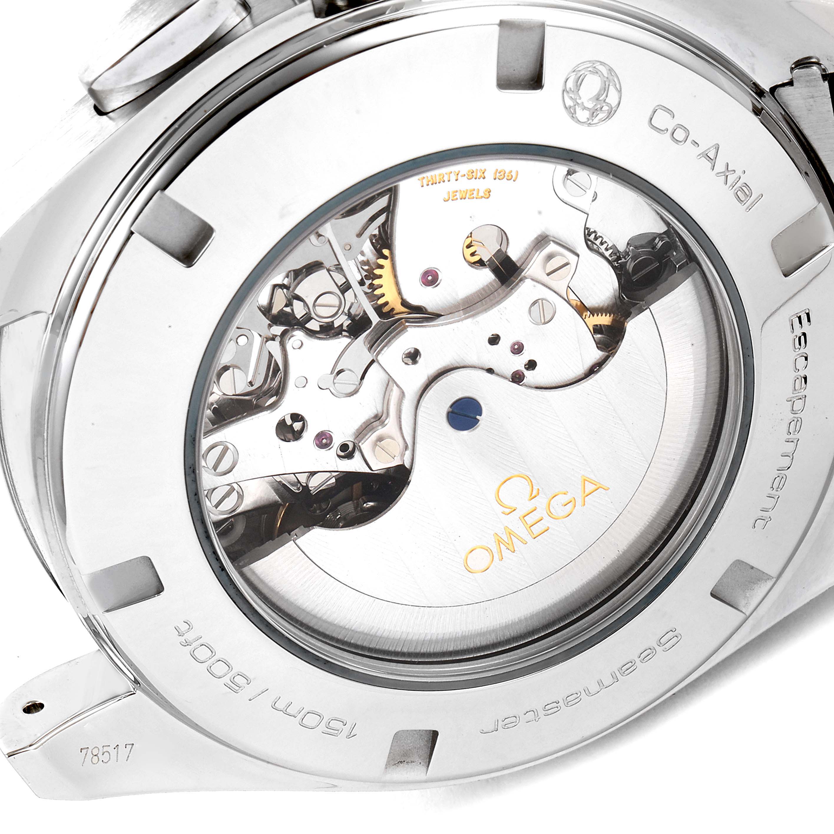 This image shows the back of an Omega Aqua Terra 231.10.44.50.04.001 Men's Stainless Steel White Dial 231.10.44.50.04.001 Men's Stainless Steel White Dial watch, highlighting its co-axial escapement mechanism.
