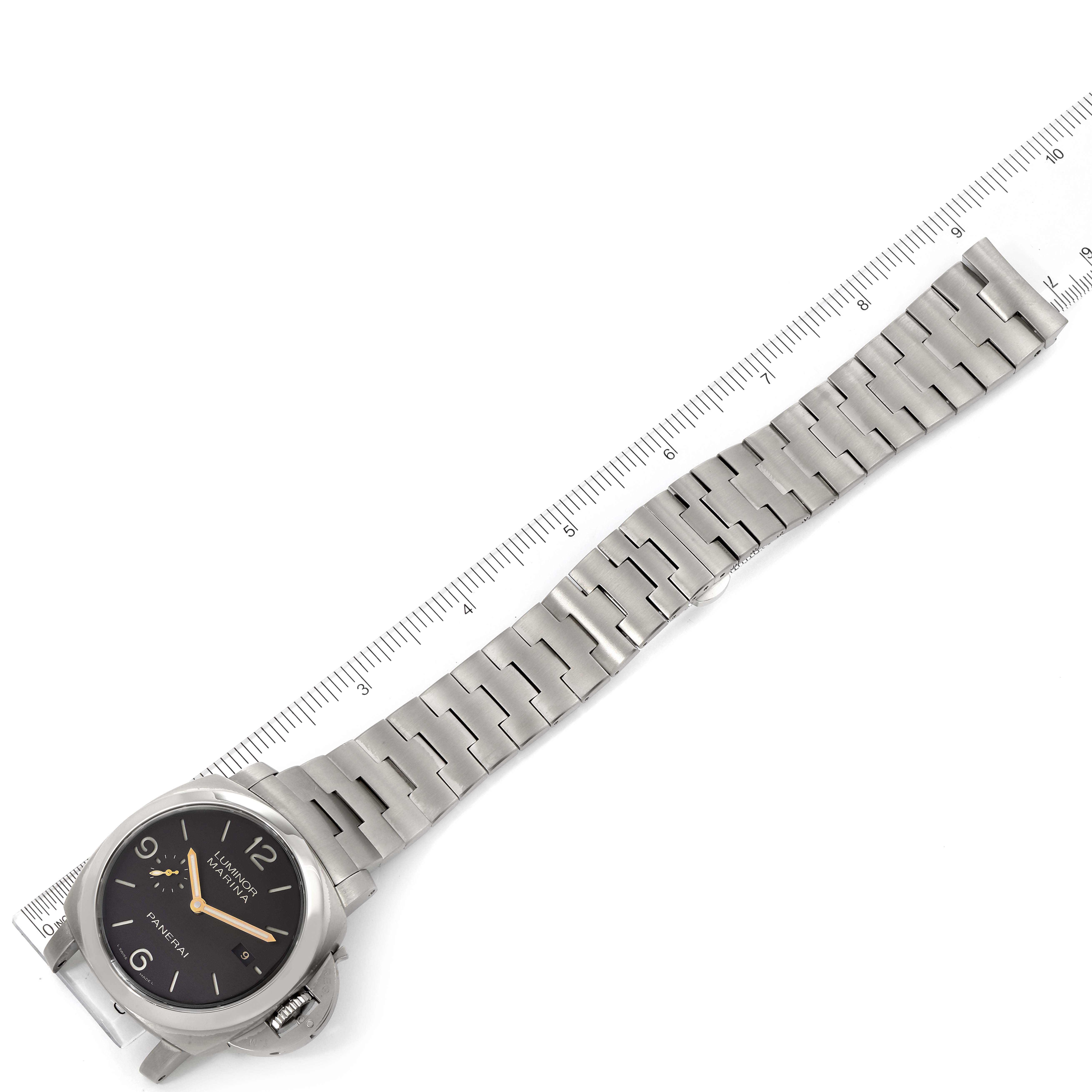 The image shows a Panerai Luminor PAM00352 Men's Titanium Brown Dial PAM00352 Men's Titanium Brown Dial watch placed flat with its metal bracelet extended and aligned next to a ruler.