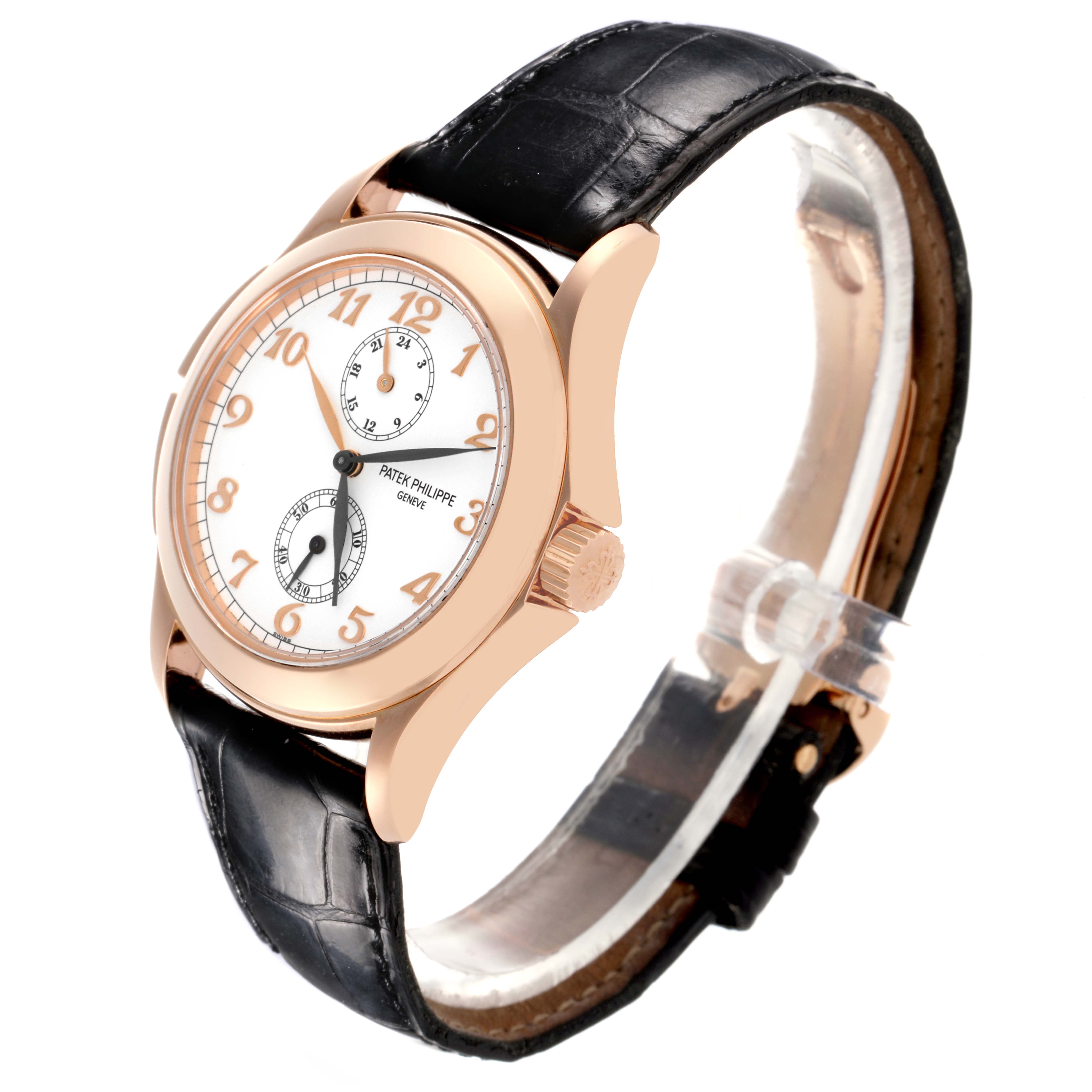 The Patek Philippe Calatrava 5134R-001 Men's Rose Gold White Dial 5134R-001 Men's Rose Gold White Dial watch is shown at a three-quarter angle, highlighting the face, crown, and leather strap.