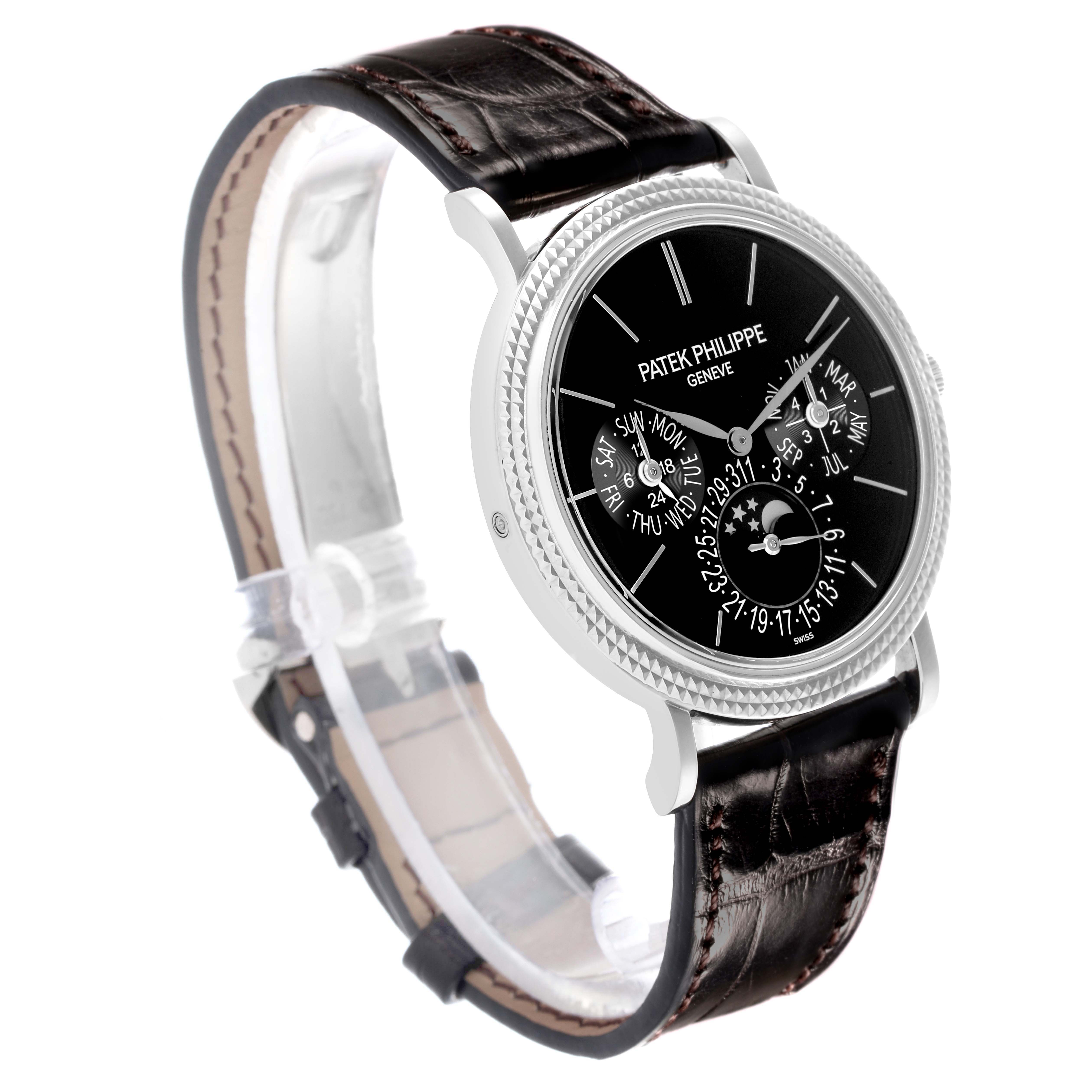 The Patek Philippe Complications 5139G Men's White Gold Black Dial watch is shown at a three-quarter angle, displaying the face, bezel, and leather strap.