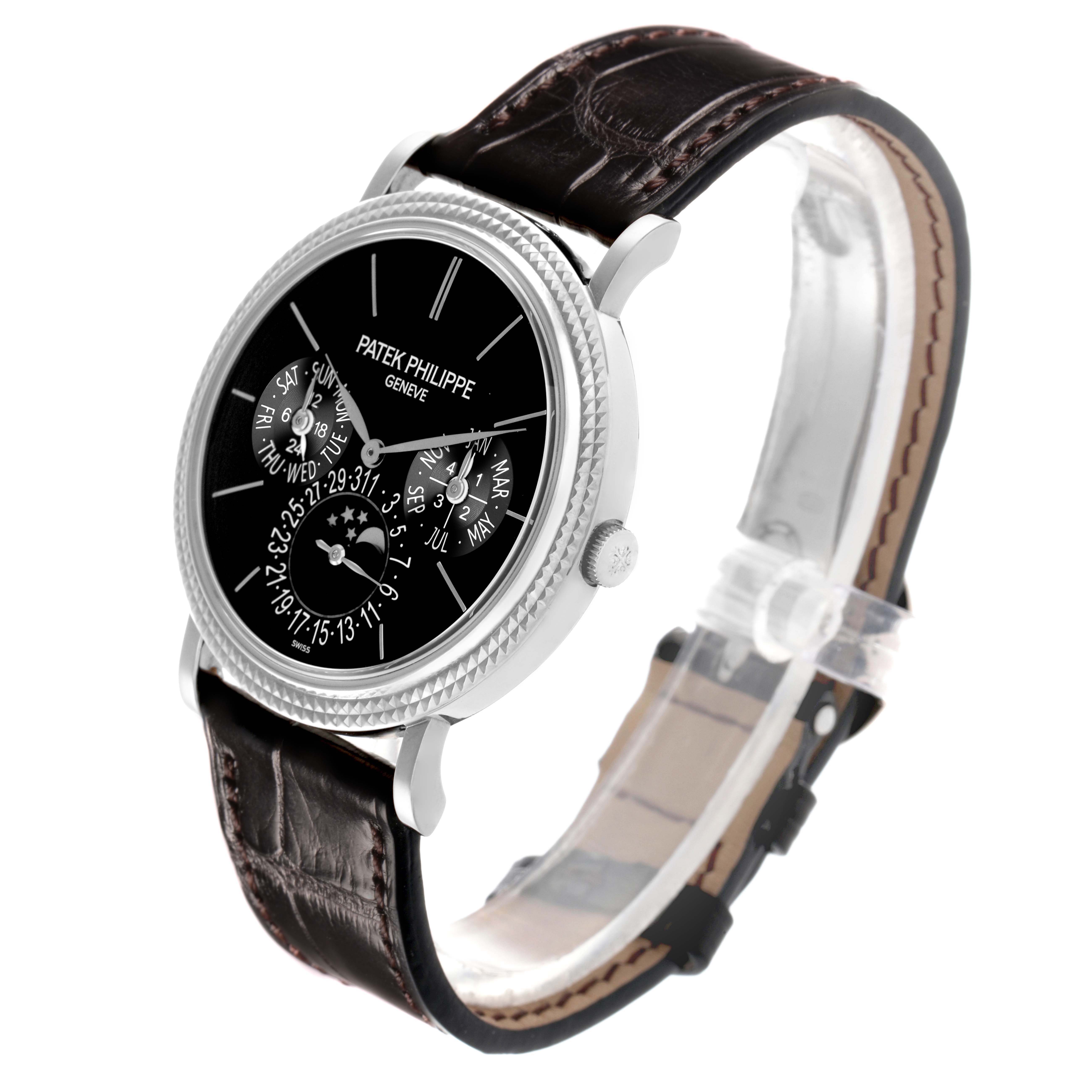 The Patek Philippe Complications 5139G Men's White Gold Black Dial watch is shown at a slight angle, highlighting the face, side profile, and strap.