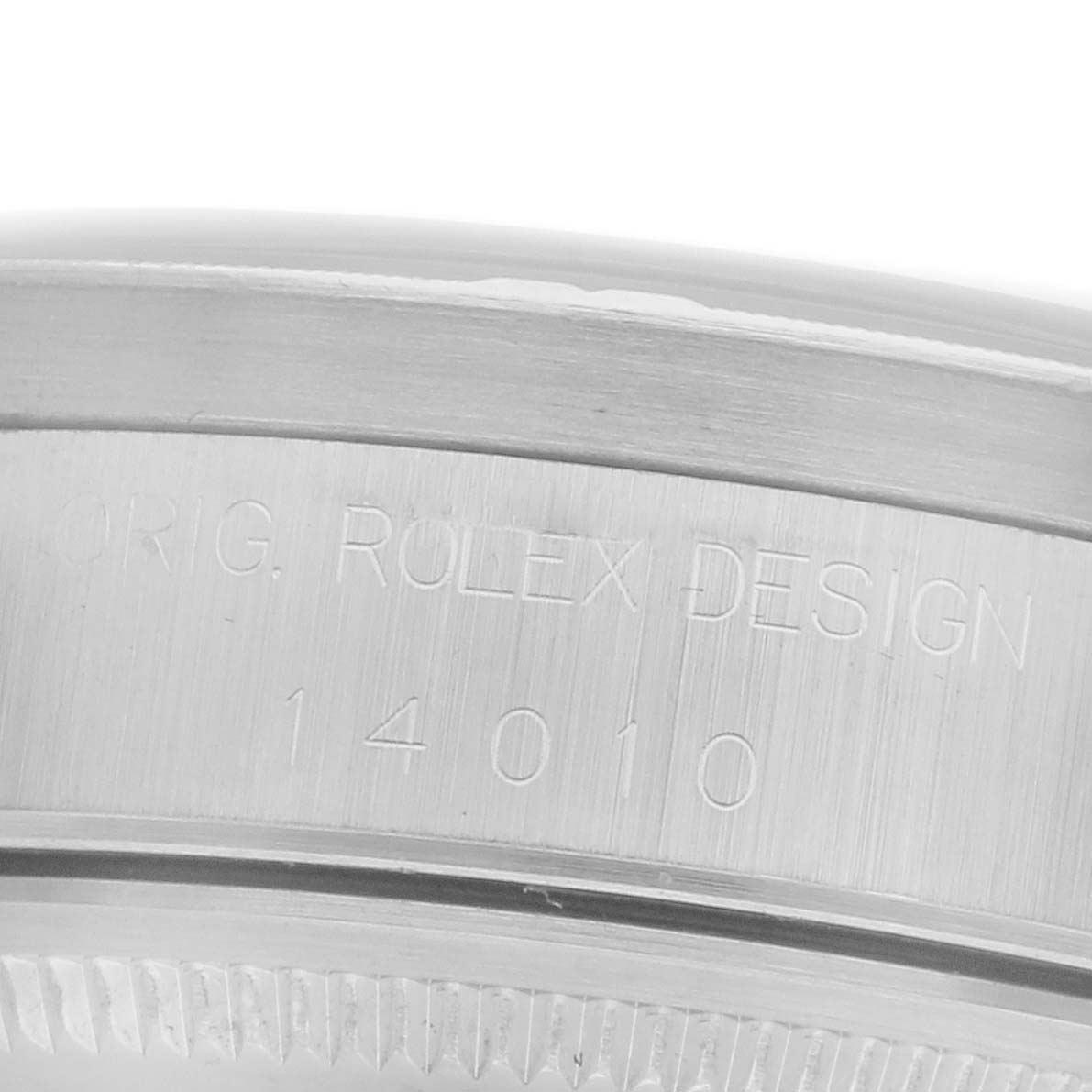 The image shows a close-up of the Rolex Air-King 14010 Men's Stainless Steel White Dial 14010 Men's Stainless Steel White Dial's side, highlighting the engraving on the bezel.