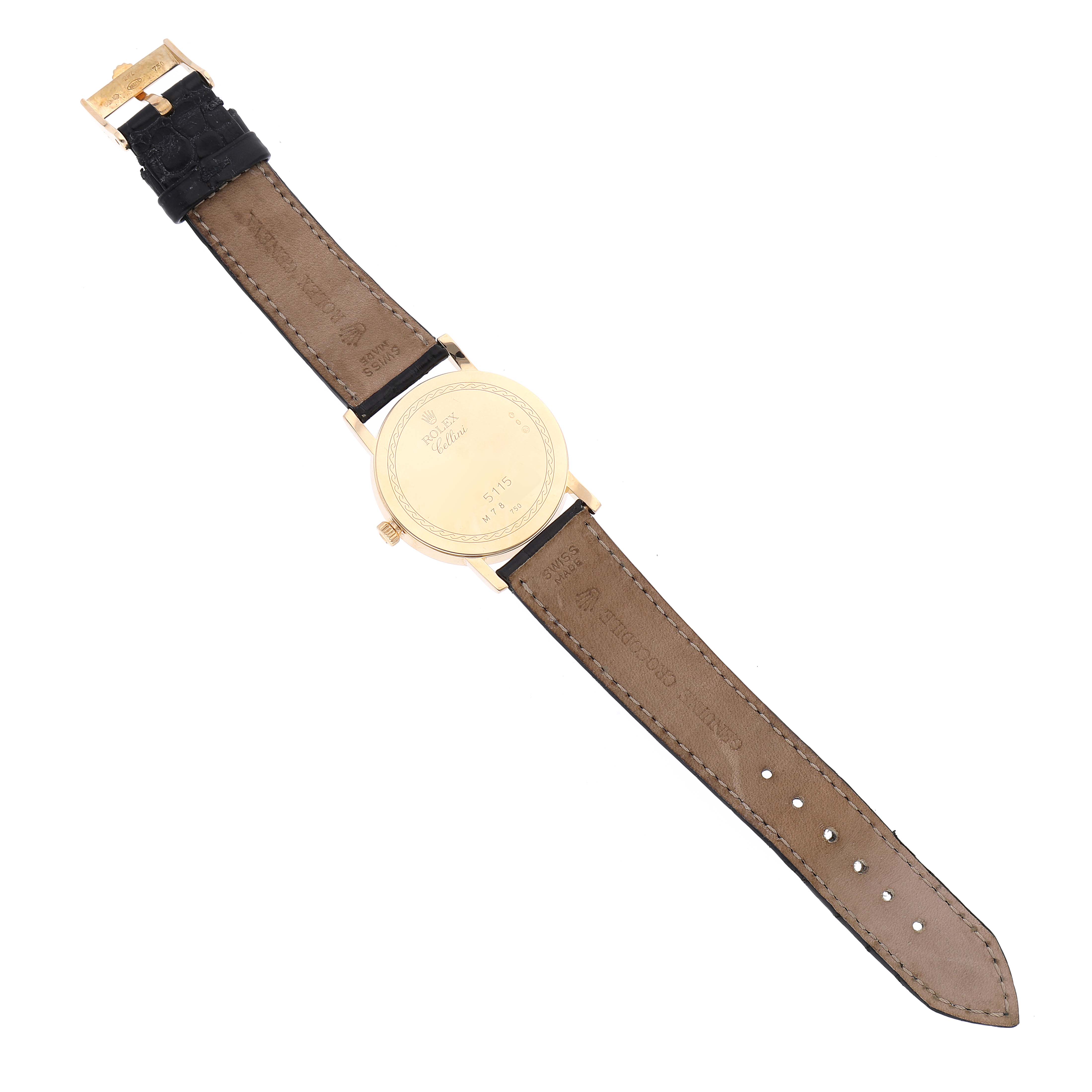 The image shows the backside of a Rolex Cellini 5115/8 Men's Yellow Gold Beige Dial 5115/8 Men's Yellow Gold Beige Dial watch, highlighting the leather strap and case back.