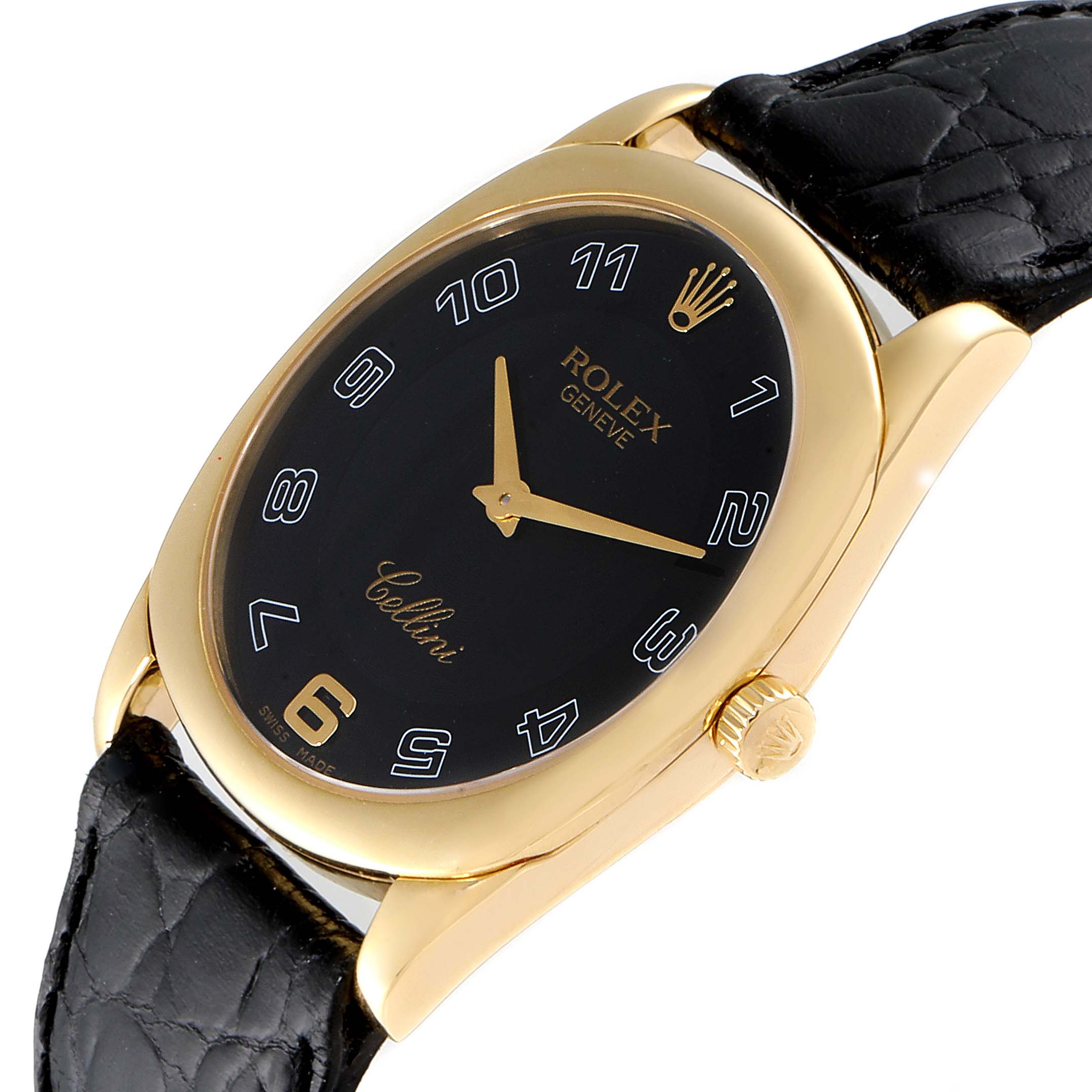 This image shows a Rolex Cellini 4233 Men's Yellow Gold Black Dial 4233 Men's Yellow Gold Black Dial watch at a slight angle, highlighting its black dial, gold case, crown, and black leather strap.