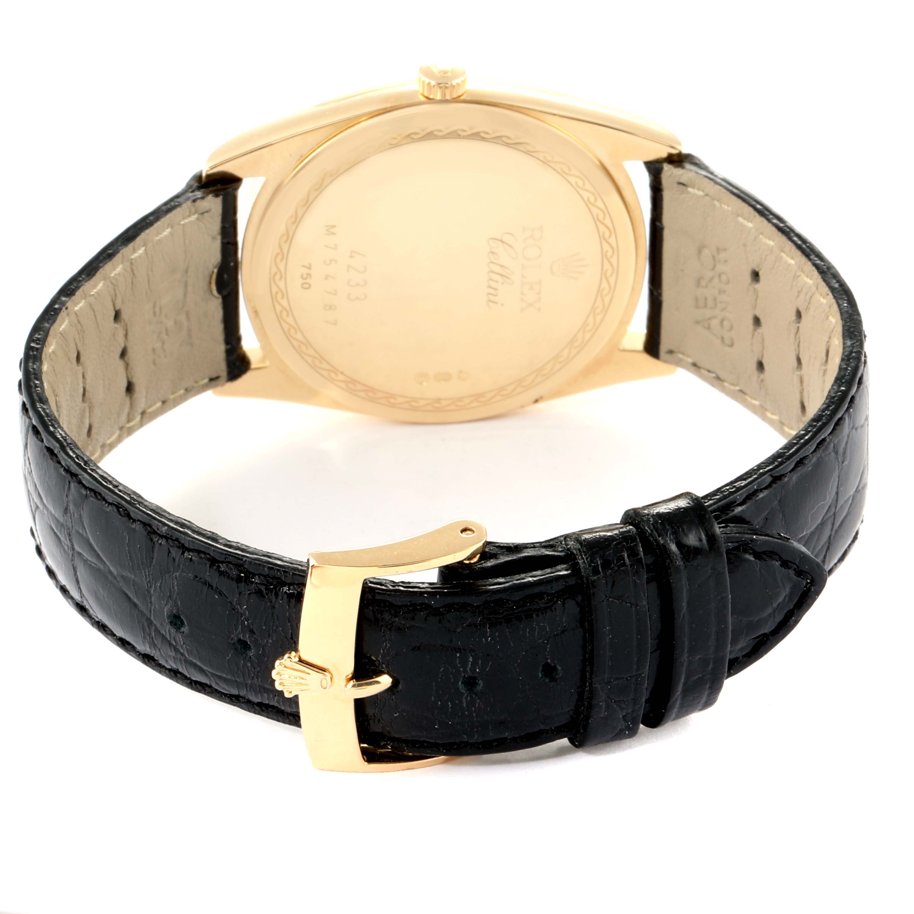 This image shows the back view of a Rolex Cellini 4233 Men's Yellow Gold Black Dial 4233 Men's Yellow Gold Black Dial watch, including its gold case back and black leather strap with a gold buckle.