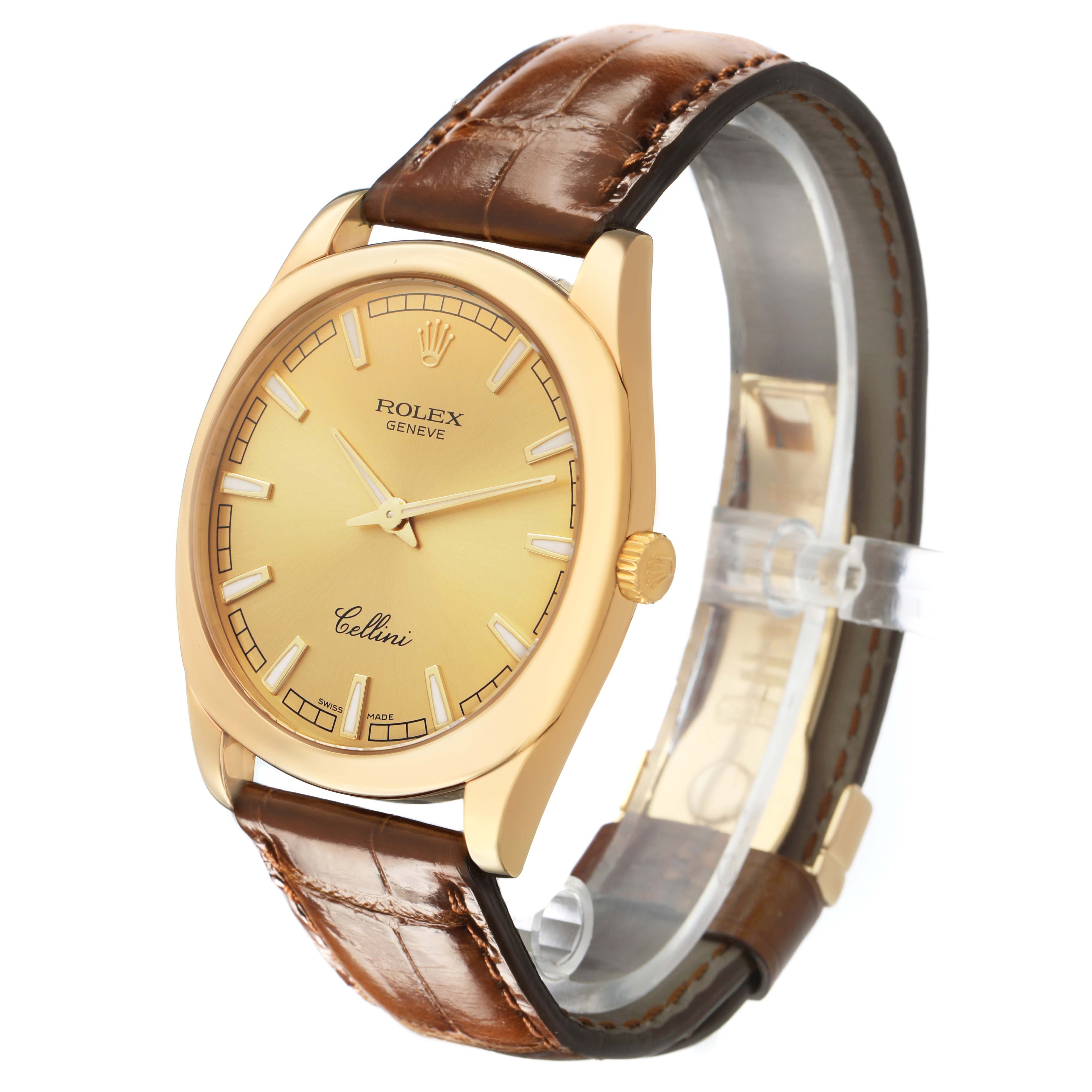 The Rolex Cellini 4243 Men's Yellow Gold Champagne Dial watch is shown at a three-quarter angle, highlighting the dial, bezel, crown, and leather strap.