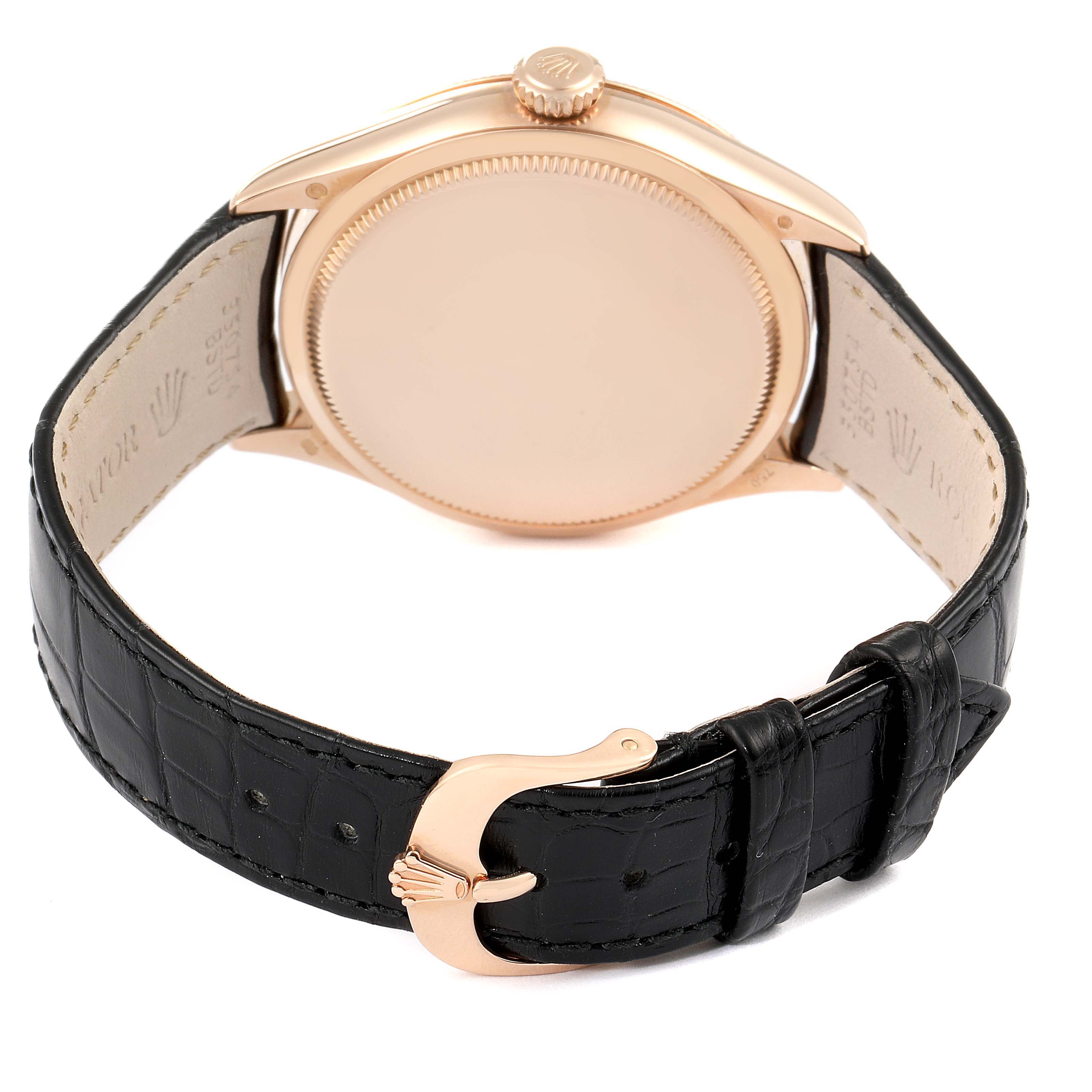 The image shows the back, crown, and clasp of a Rolex Cellini 50505 Men's Rose Gold Black Dial 50505 Men's Rose Gold Black Dial watch with a black leather strap and rose gold case.