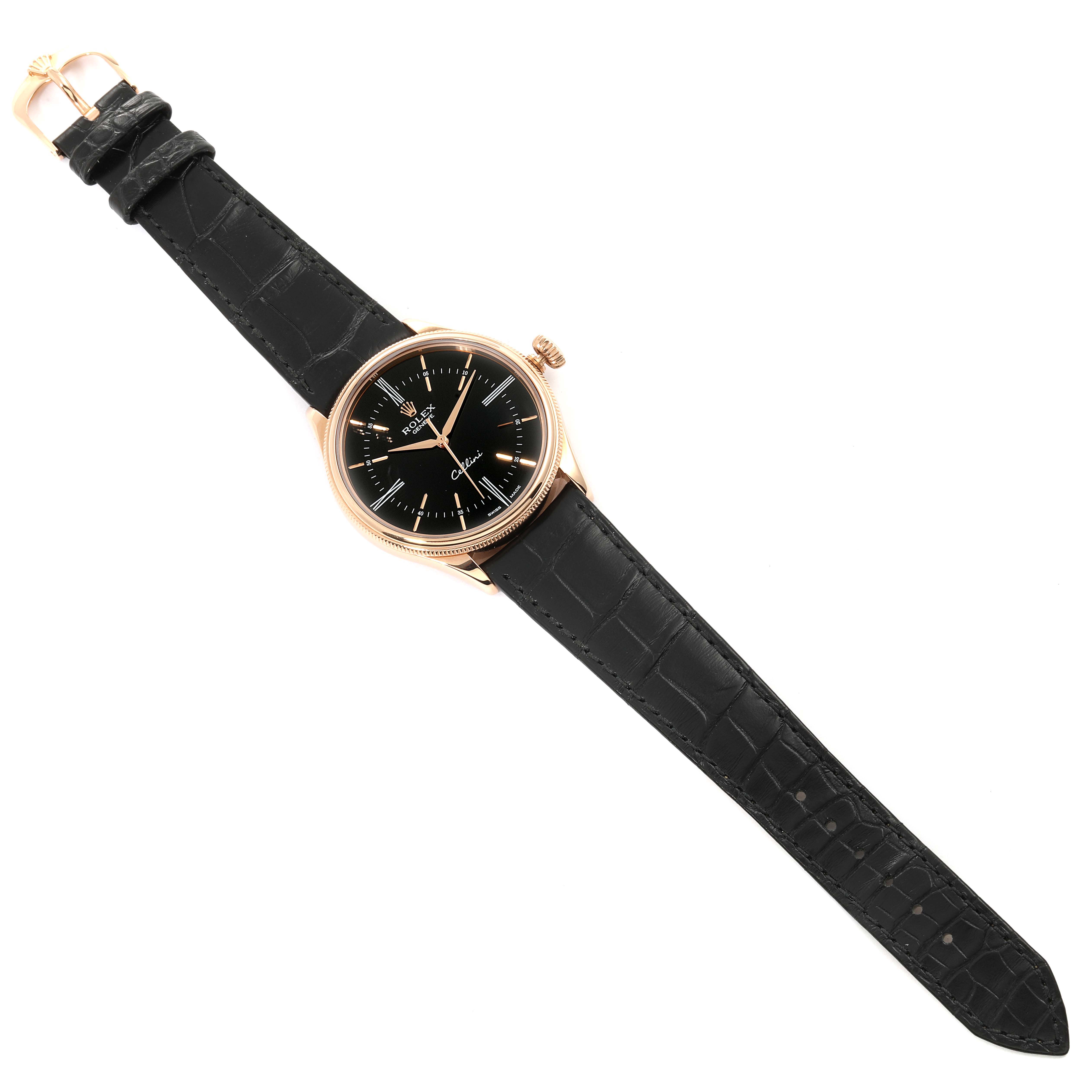 The Rolex Cellini 50505 Men's Rose Gold Black Dial 50505 Men's Rose Gold Black Dial watch is shown from a top-down angle, displaying the black dial, gold case, crown, and black leather strap.