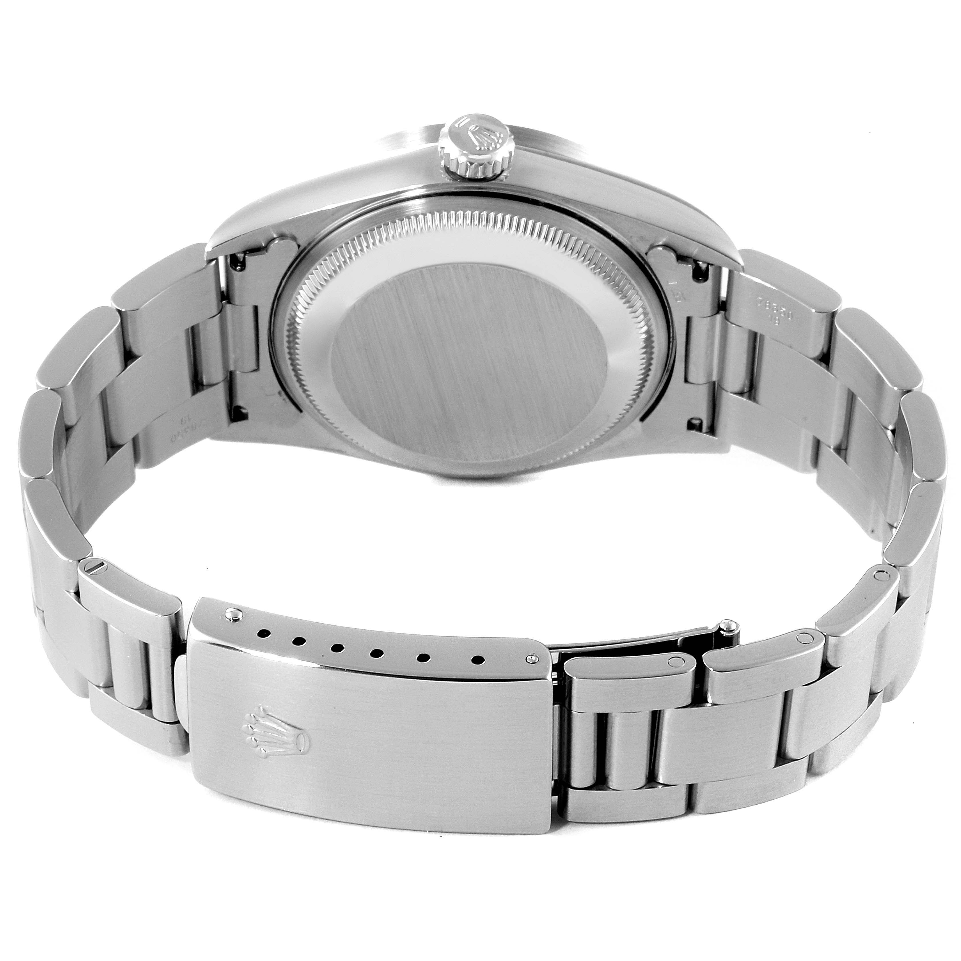 The image shows the rear view of the Rolex Date 15210 Men's Stainless Steel Silver Dial 15210 Men's Stainless Steel Silver Dial model watch, including the case back, crown, and bracelet with the clasp.