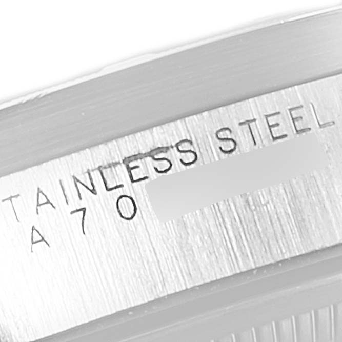 The image shows a close-up of the engraving on the stainless steel case side of the Rolex Date 15210 Men's Stainless Steel Silver Dial 15210 Men's Stainless Steel Silver Dial watch.