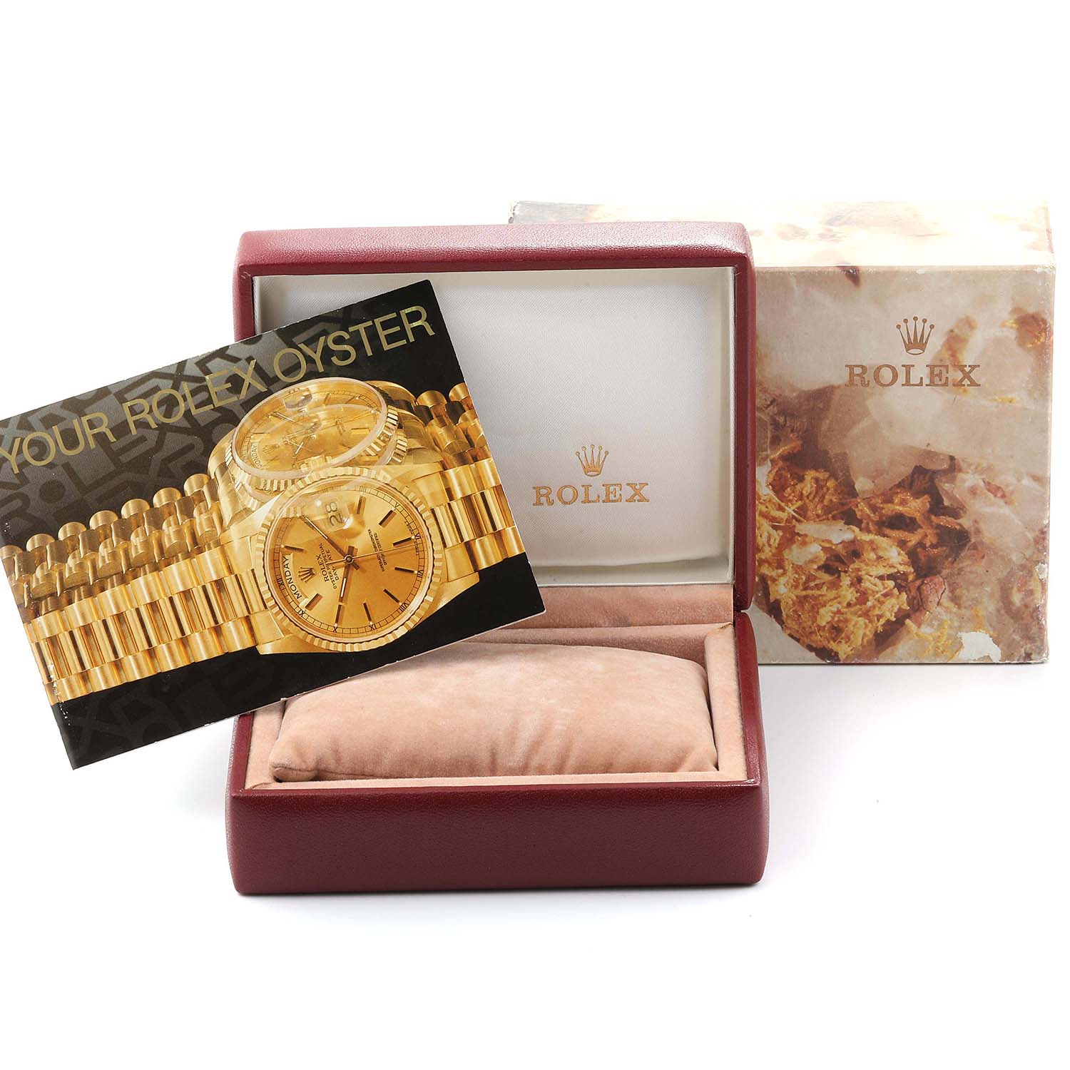 The image shows a Rolex Datejust 69173  Women's Stainless Steel Champagne Dial 69173  Women's Stainless Steel Champagne Dial watch box, manual, and cushion from a slightly elevated angle.