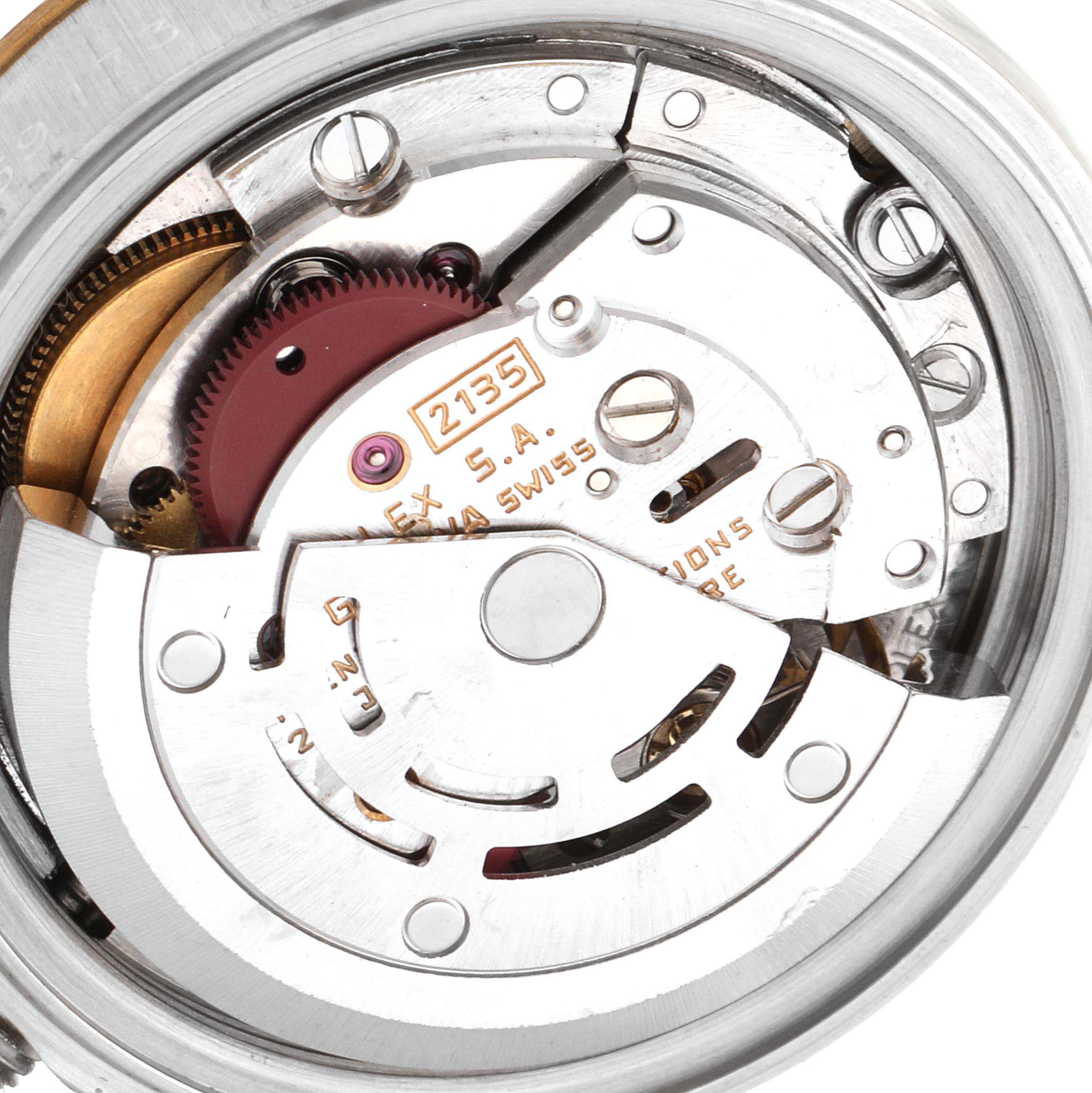 This is an internal view of the Rolex Datejust 69173  Women's Stainless Steel Champagne Dial 69173  Women's Stainless Steel Champagne Dial watch, showing its movement mechanisms and components.