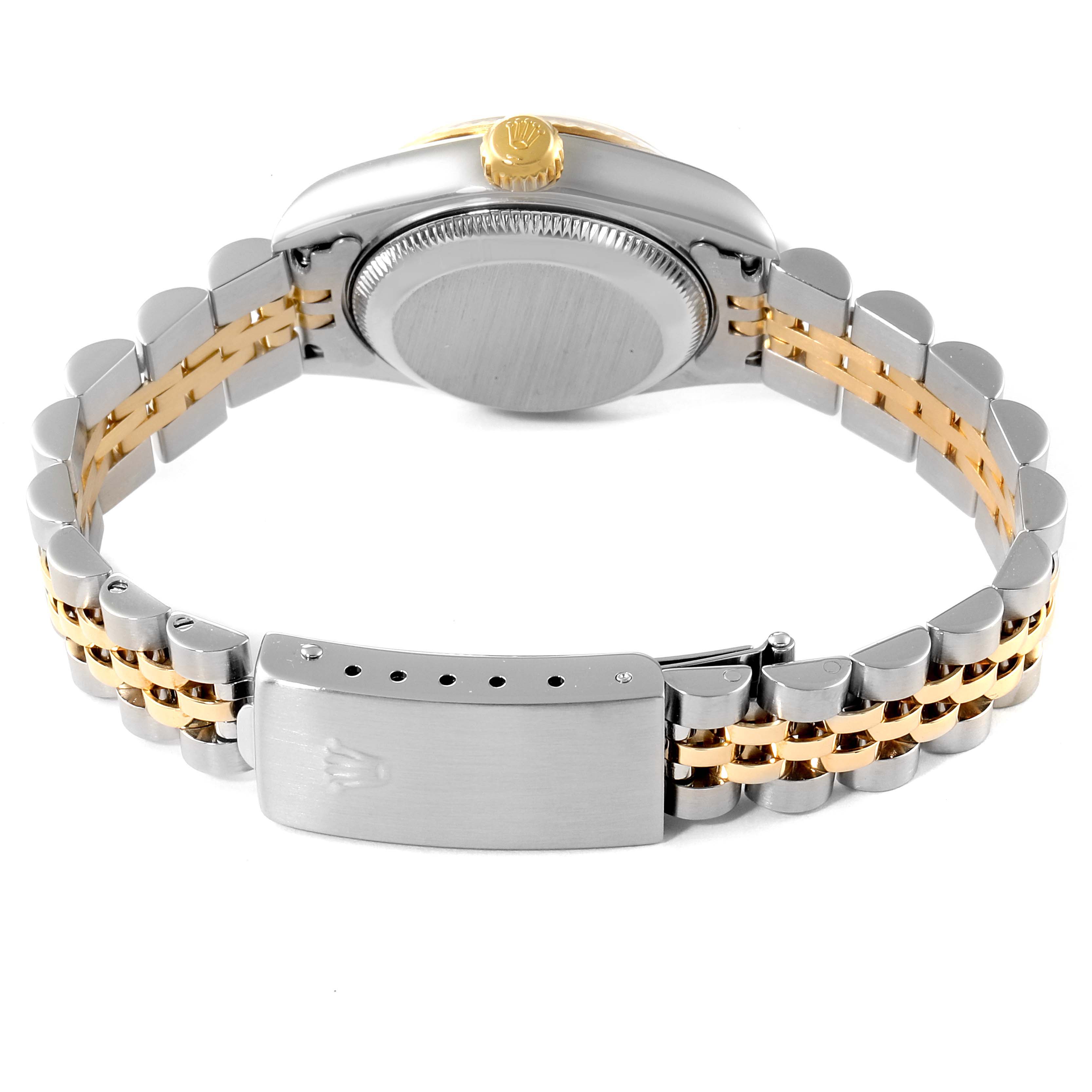 The image shows the back view of a Rolex Datejust 79173 Women's Steel and Gold (two tone) White Dial 79173 Women's Steel and Gold (two tone) White Dial watch, highlighting its two-tone bracelet and clasp.