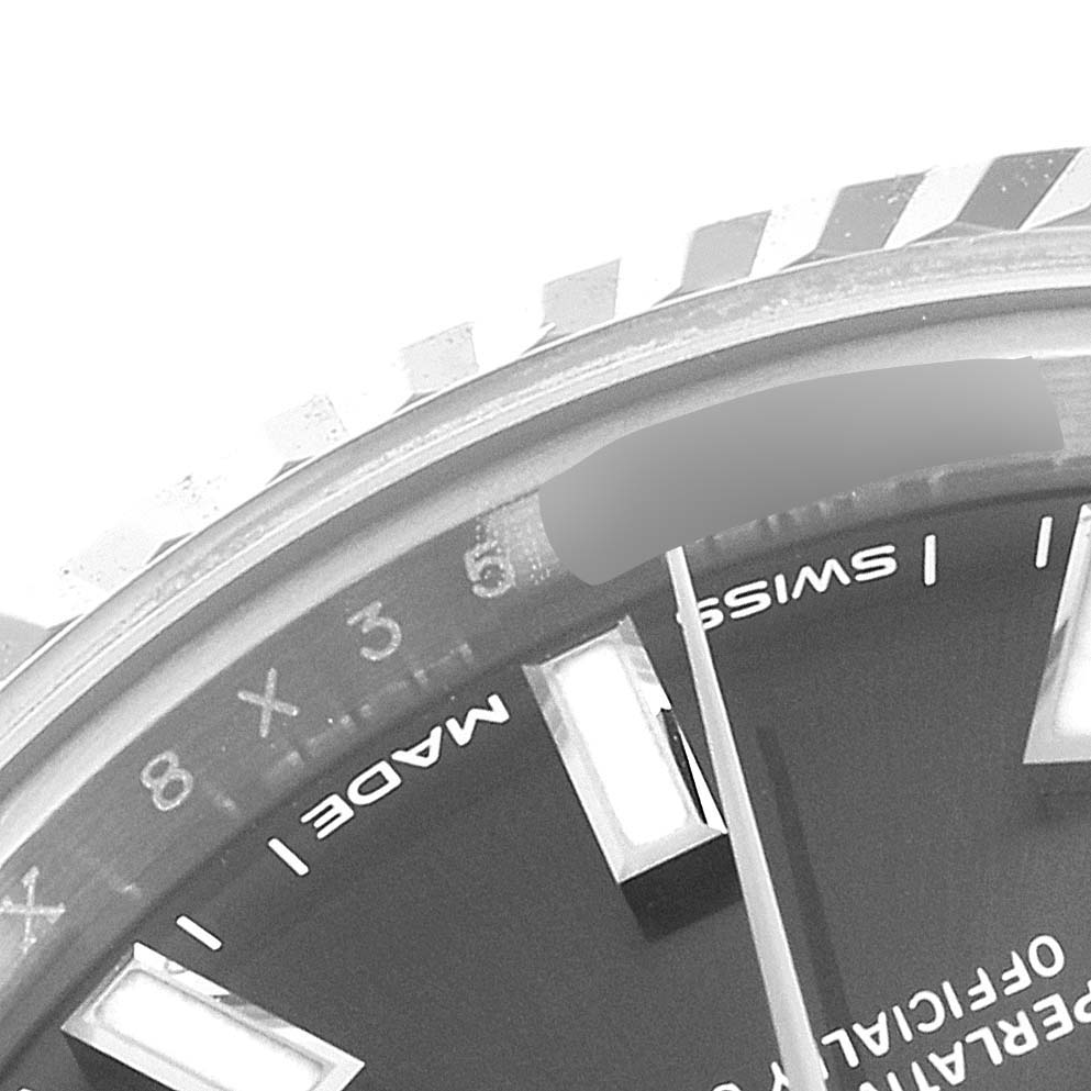 The image shows a close-up of the dial, hour markers, and part of the fluted bezel of a Rolex Datejust 279174 Women's Stainless Steel Grey Dial 279174 Women's Stainless Steel Grey Dial watch.