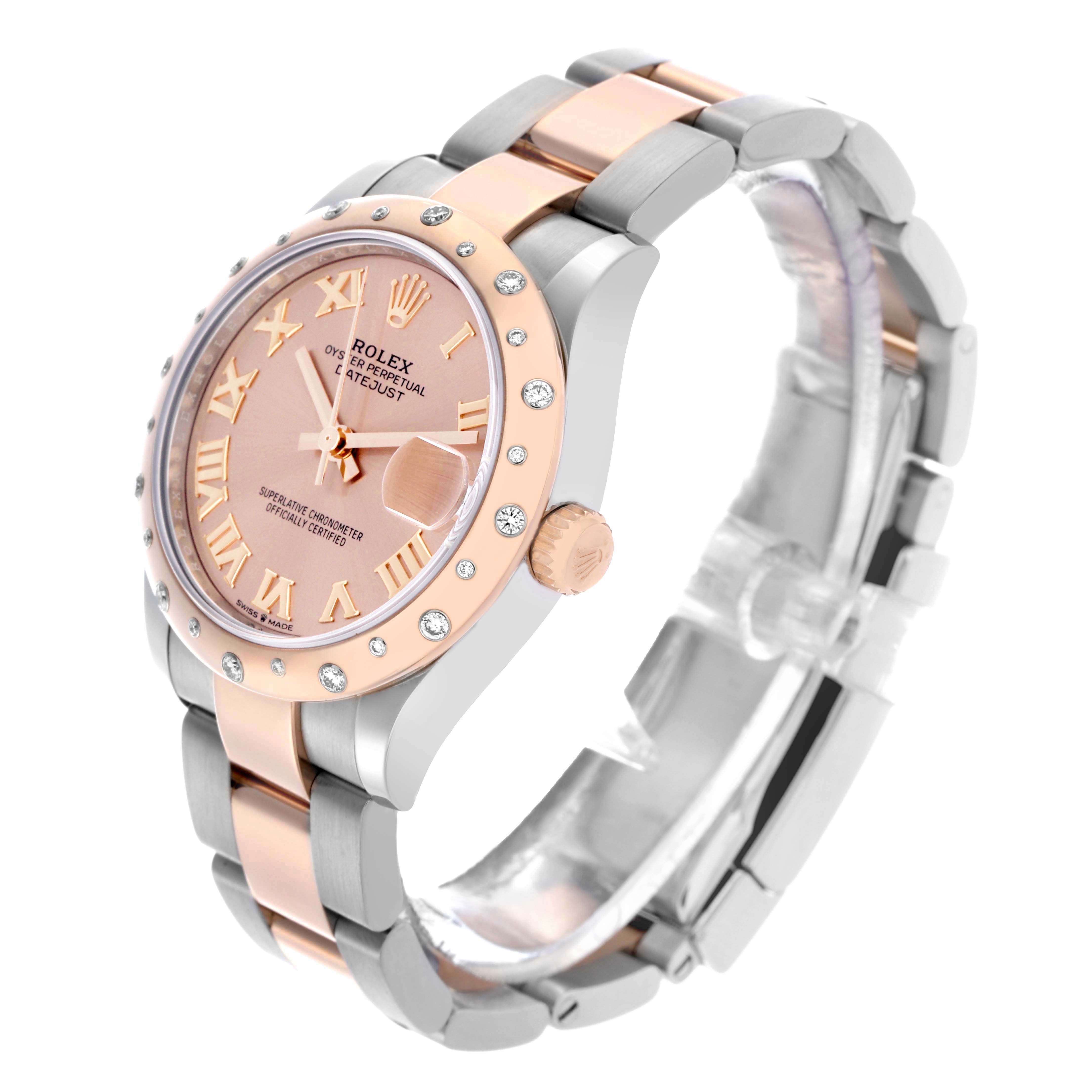 The Rolex Mid-Size 278241 Women's Steel and Gold (two tone) Pink Dial watch is shown at a three-quarter angle, highlighting its two-tone band and diamond-accented bezel.