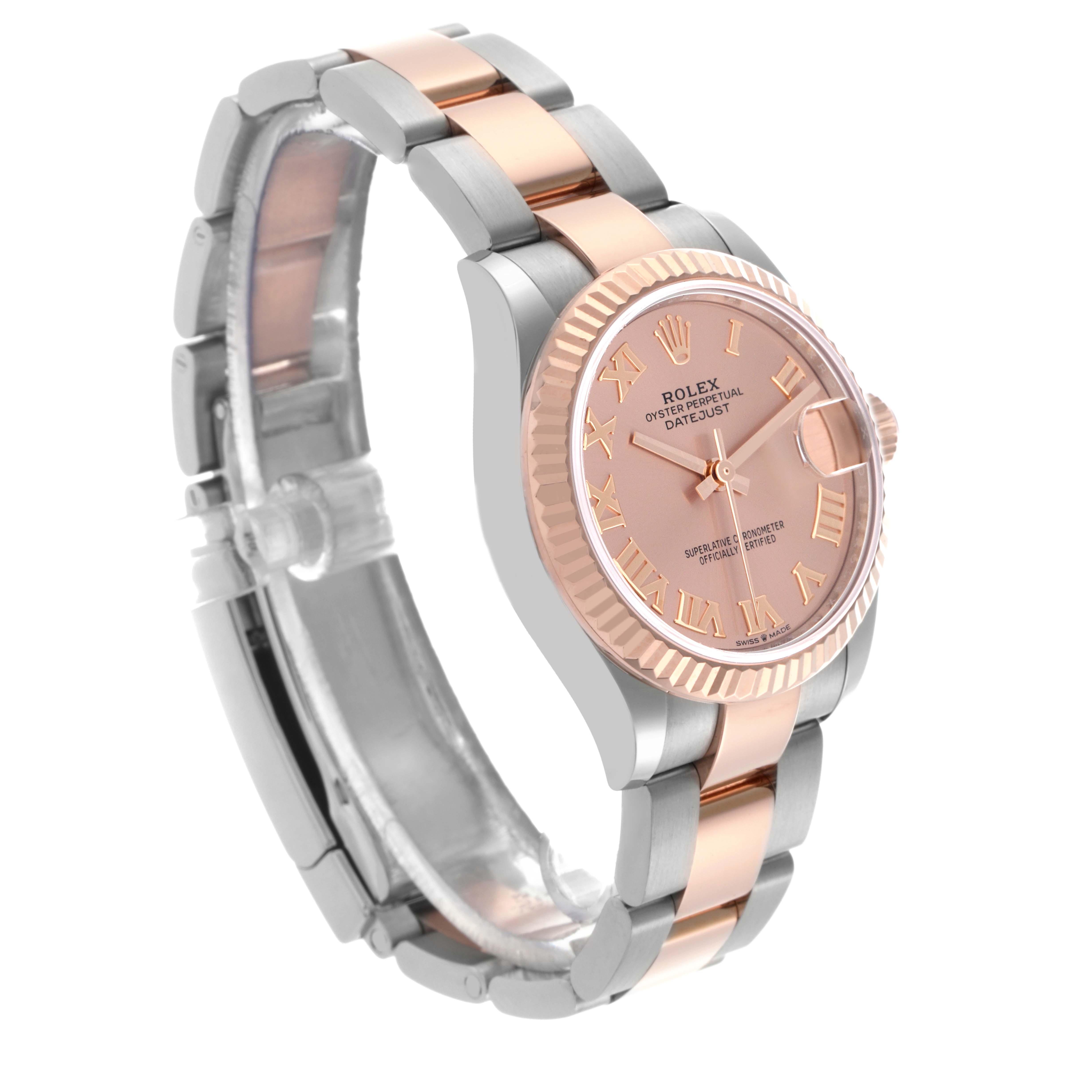 The Rolex Mid-Size 278271 Women's Steel and Gold (two tone) Pink Dial 278271 Women's Steel and Gold (two tone) Pink Dial Datejust is shown at a three-quarter angle, highlighting its two-tone bracelet and fluted bezel.